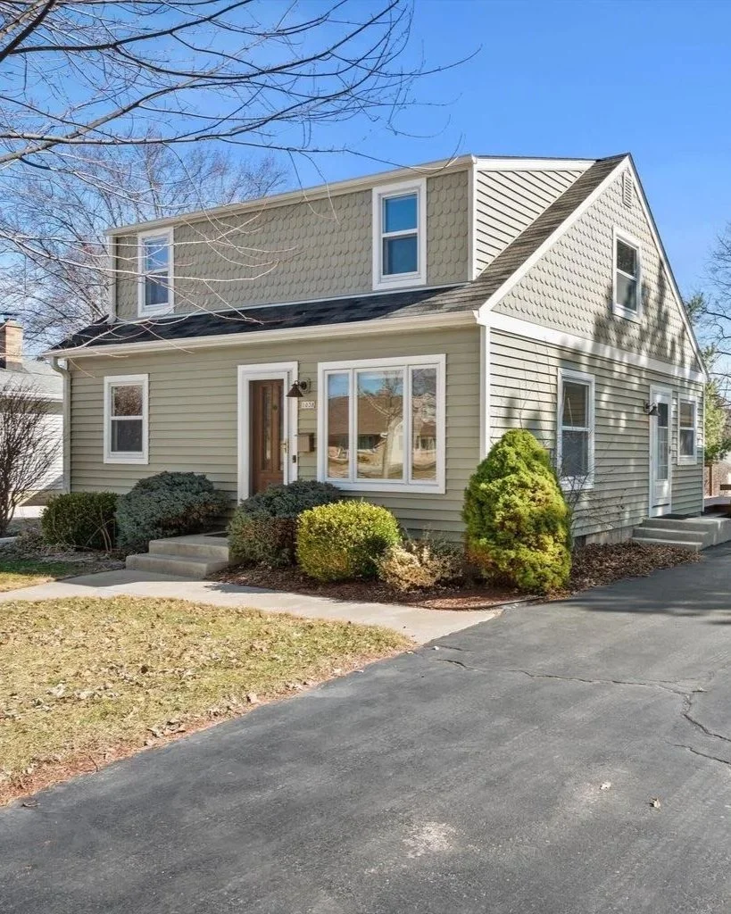Sage green Cape Cod style home sold in the Milwaukee area