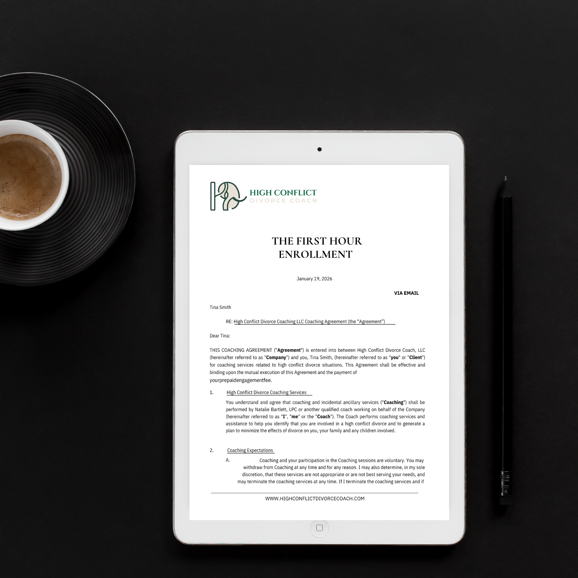 A tablet displaying a divorce coaching agreement document from High Conflict Divorce Coach, placed on a black surface. To the left of the tablet is a cup of coffee resting on a black plate, and to the right is a black pen.
