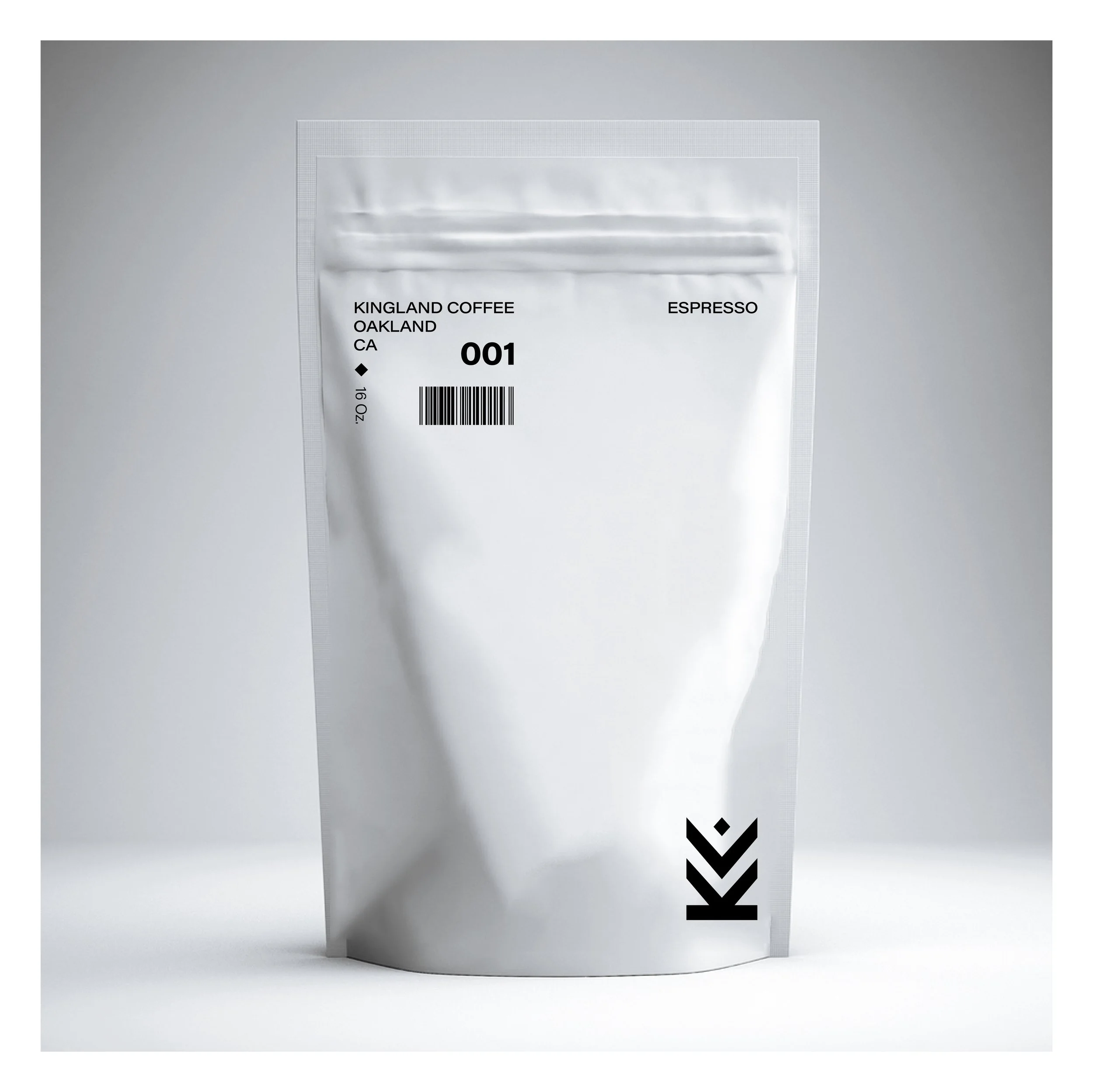 A white package of Kingland Coffee Oakland, CA espresso with a barcode and black arrow graphics on the bottom right corner, set against a light gray background.