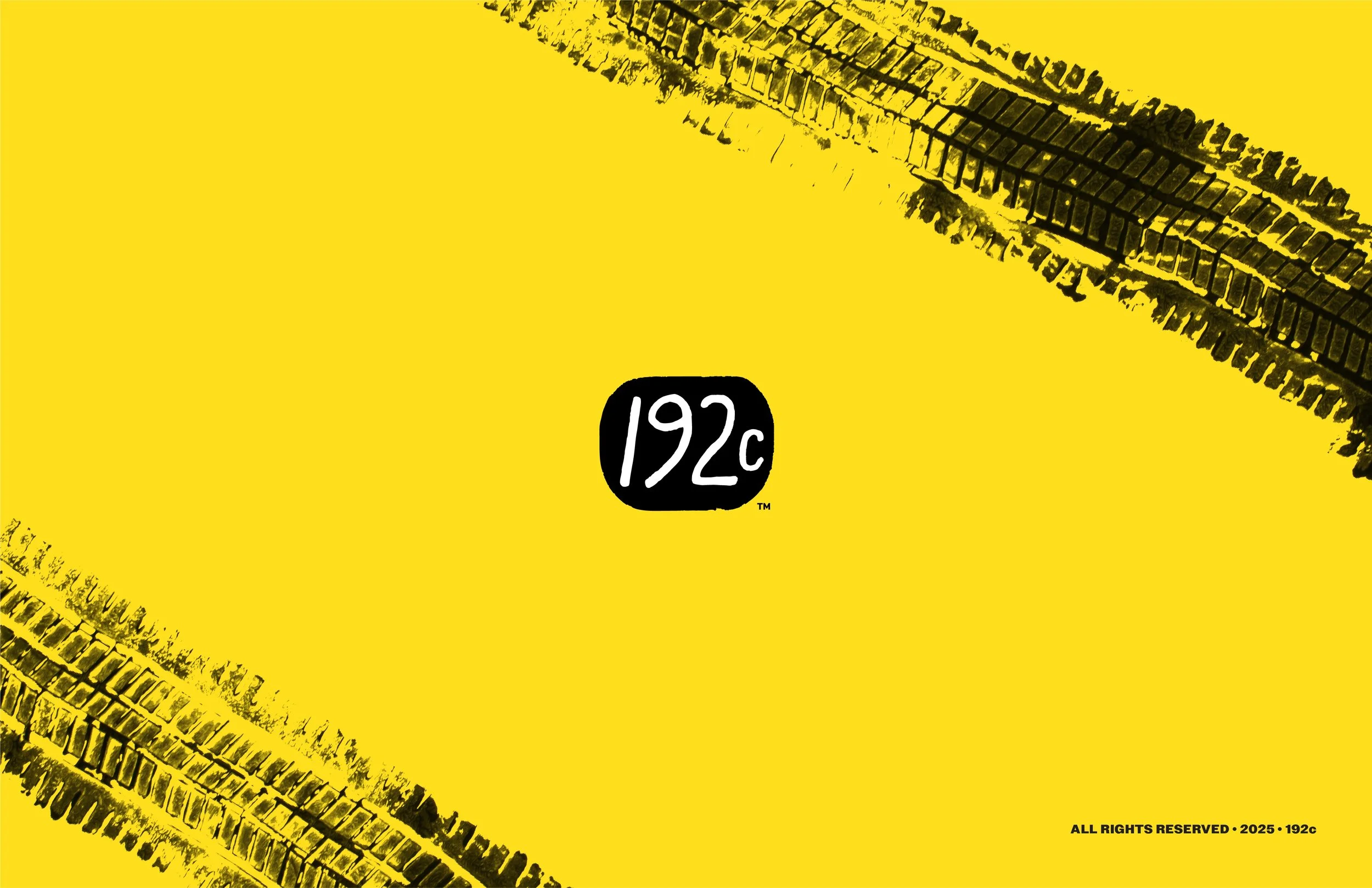 Yellow background with black tire tracks crossing diagonally and a black circle with white text that says '192c' in the center. Small text at the bottom right corner reads, 'ALL RIGHTS RESERVED • 2025 • 192c.'