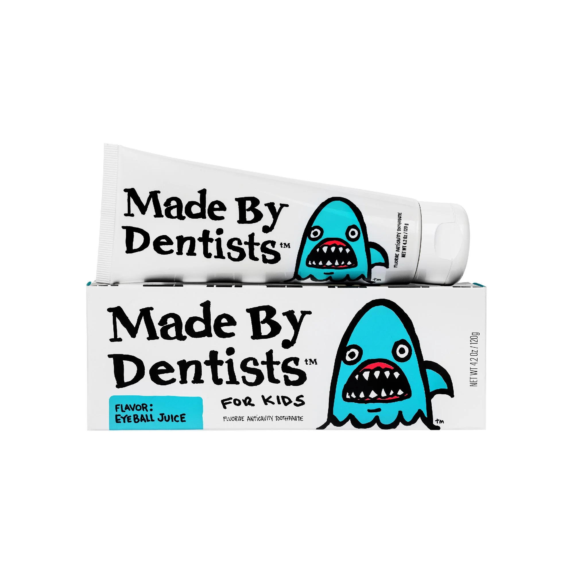 A cartoon illustration of a blue, monster-like creature with sharp teeth and a wide mouth on a toothpaste box labeled "Made By Dentists for Kids" with flavor "Eyeball Juice".