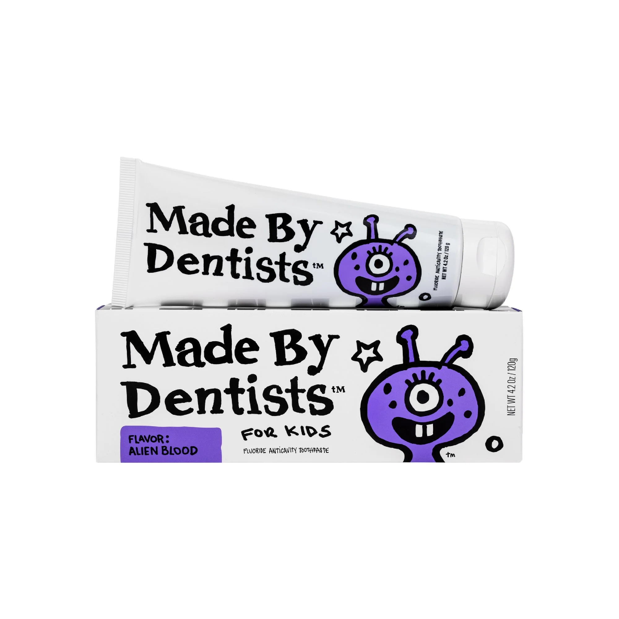 A tube of toothpaste labeled "Made By Dentists for Kids" with a purple monster character and flavor "Alien Blood."
