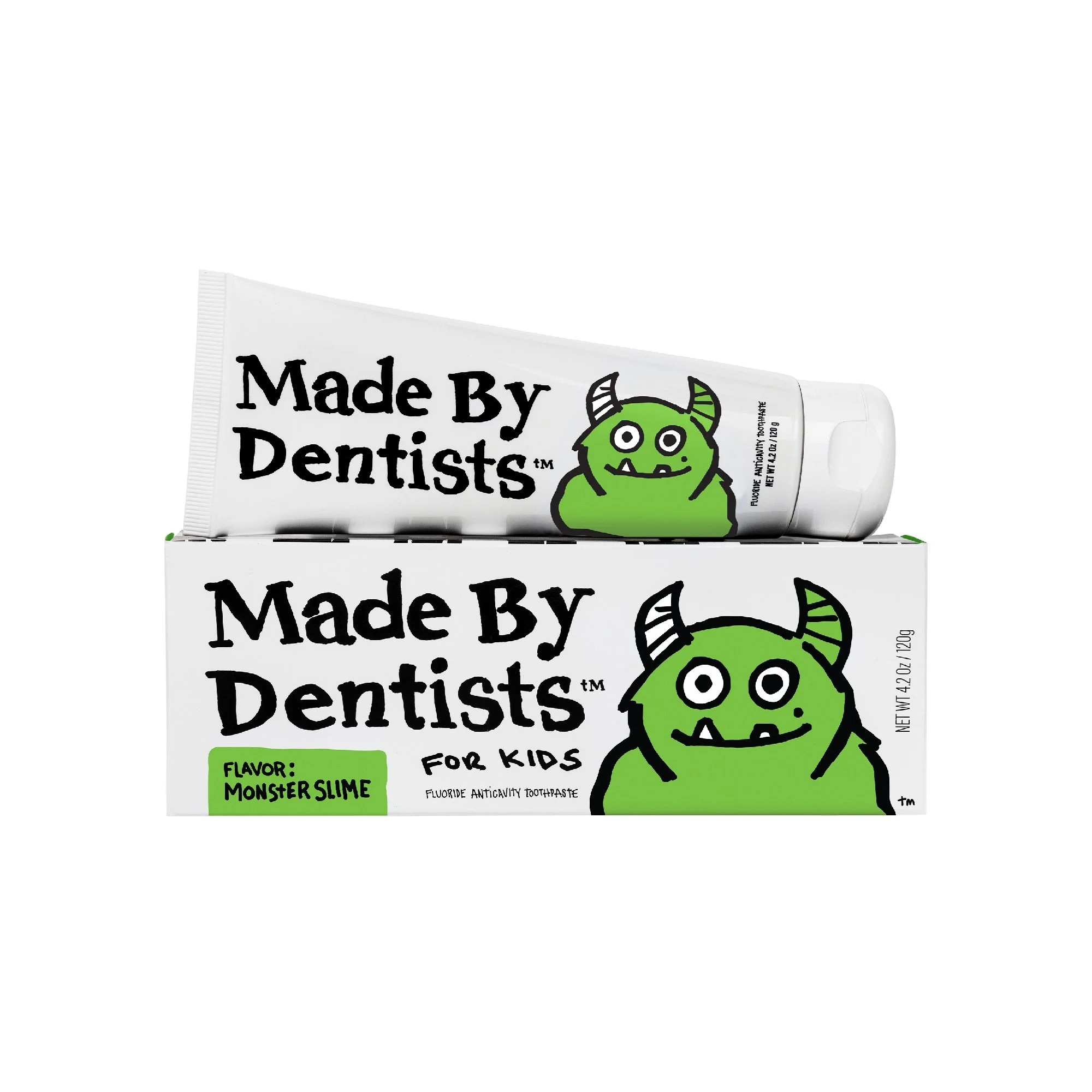 A tube of toothpaste with cartoon monster graphic and text that reads 'Made By Dentists for Kids,' indicating flavored toothpaste with monster slime flavor.