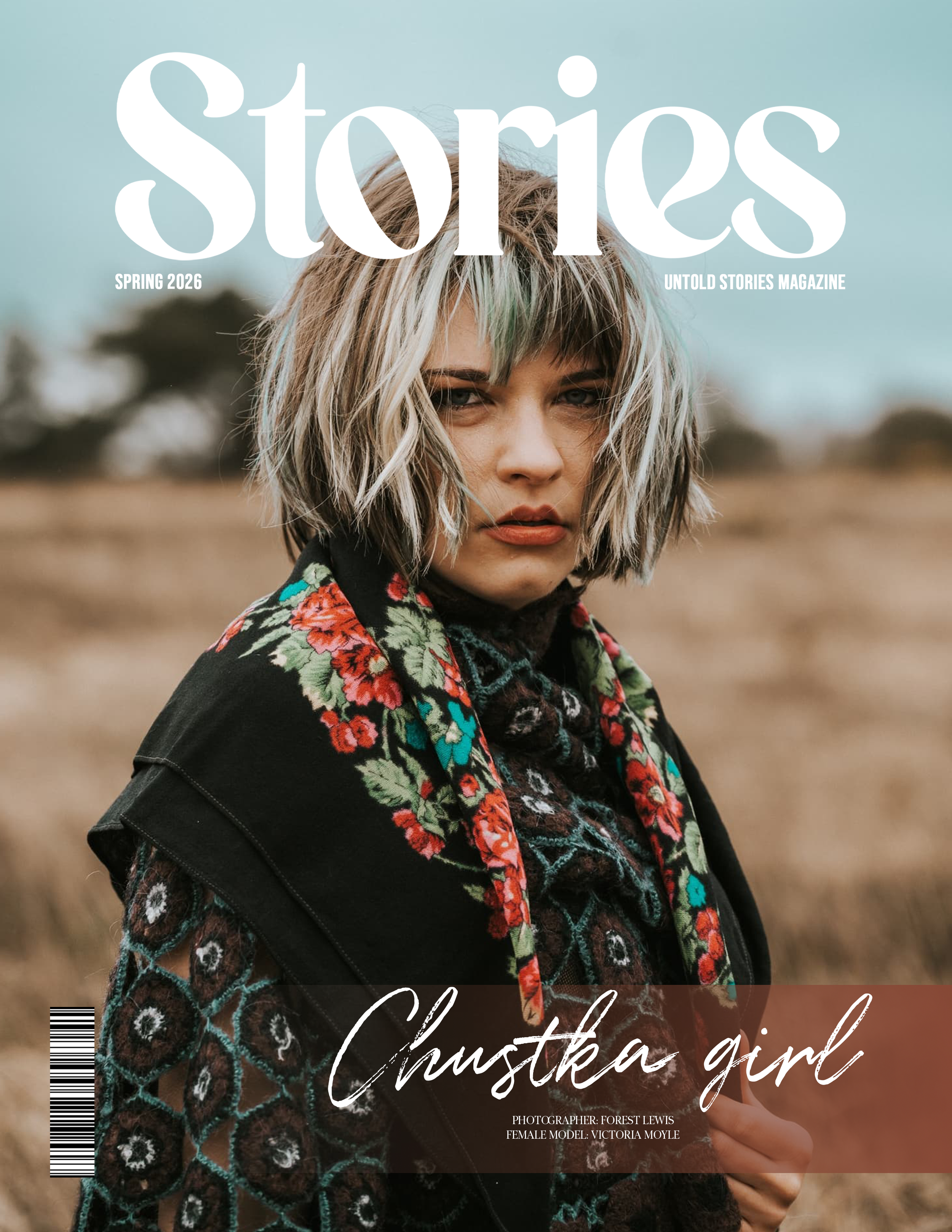 Magazine cover titled "Stories" for Spring 2026 by Untold Stories Magazine featuring a woman with short, tousled blonde hair and a floral embroidered jacket in an outdoor setting.