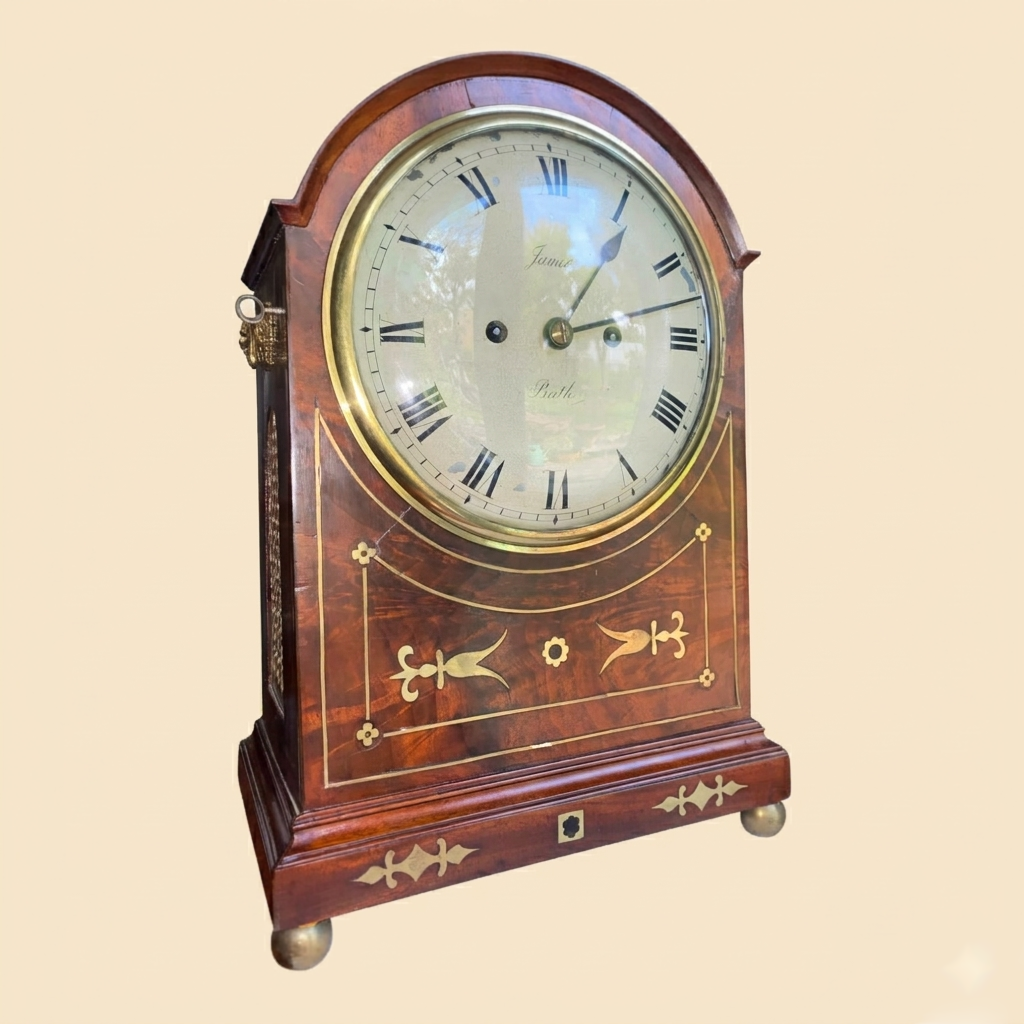 A vintage wooden mantel clock with gold accents and a glass face showing Roman numerals. The clock has decorative inlay designs on the front.