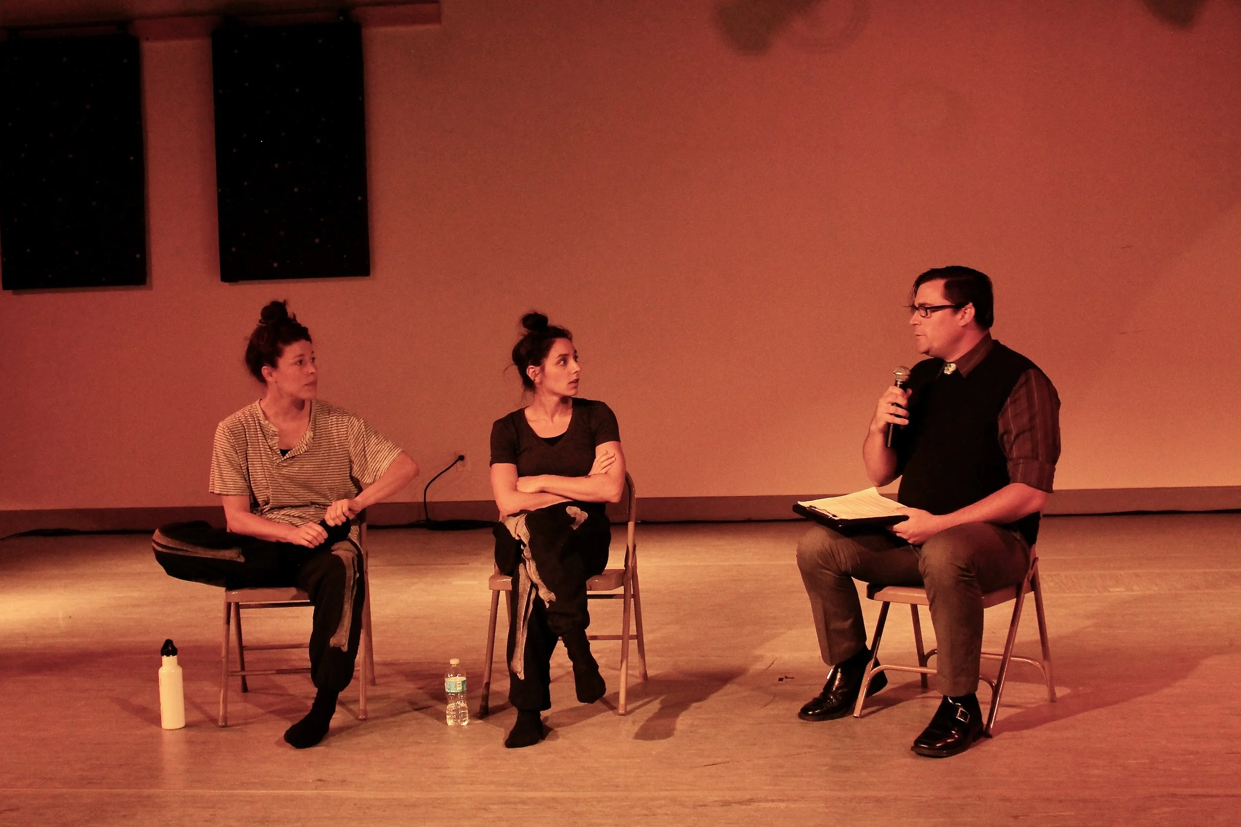 Leah and Anna sit with Patience onstage for a mid-show talkback. 