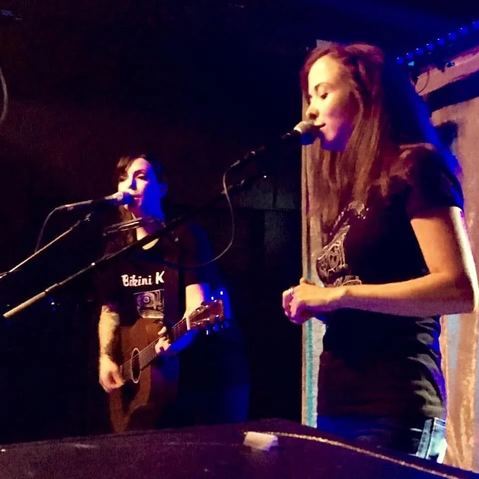 vocal performance by two adult singers