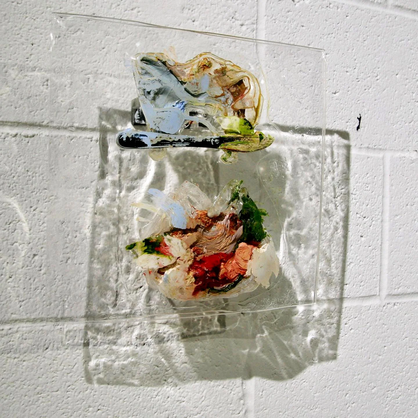 Reliquary (angled view), 2018, 12 x 12 x 3.5 in, oil paint, plastic knife, melted acrylic