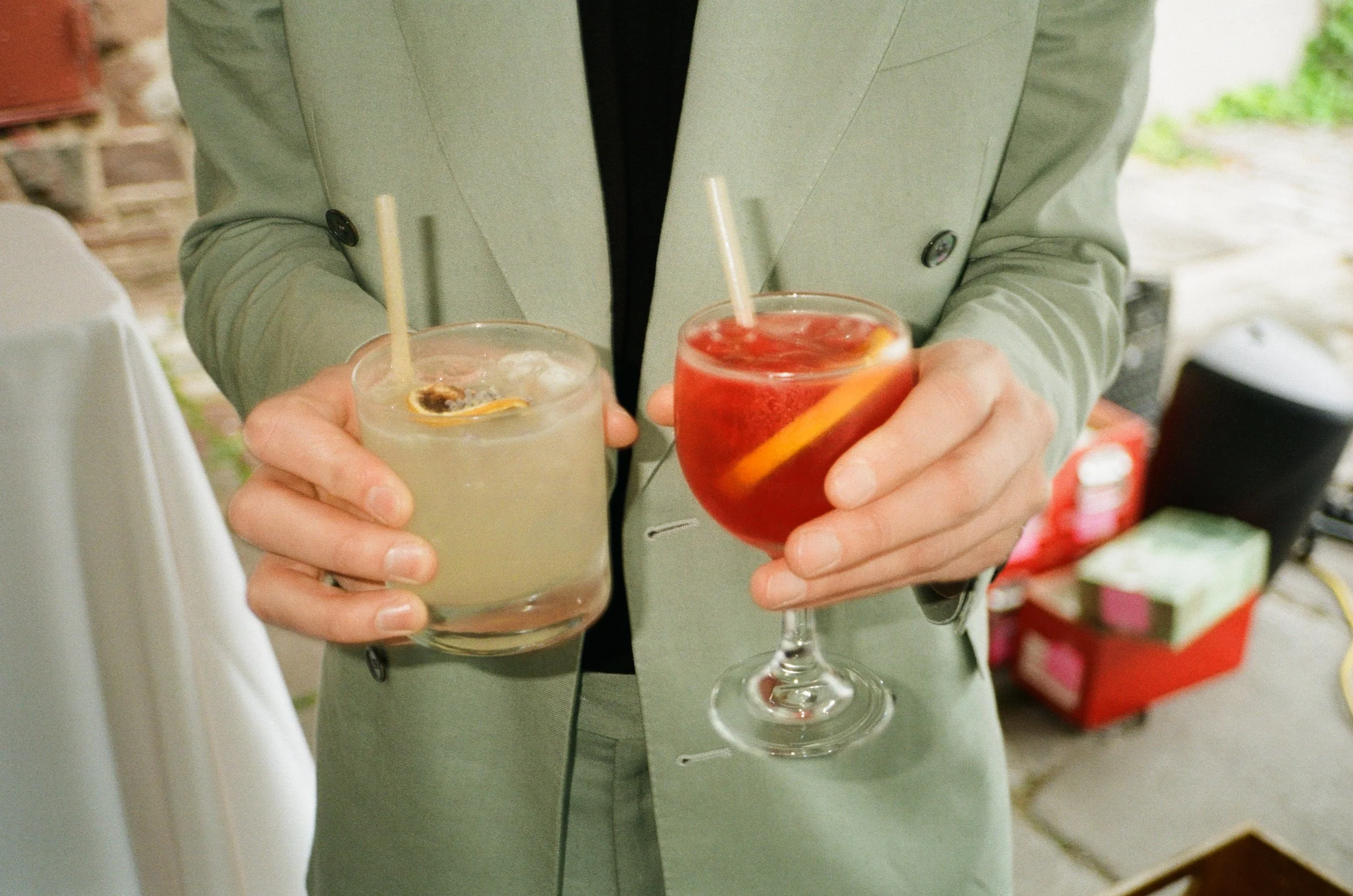 The Charlie cocktail is on the left, who’s namesake is a cool-calm collected lab husky mix—  this Italicus, lavender, rosemary margarita riff was a huge hit at this stunning wedding. 
On the right is the Oskar cocktail. Named after a small yet voraci