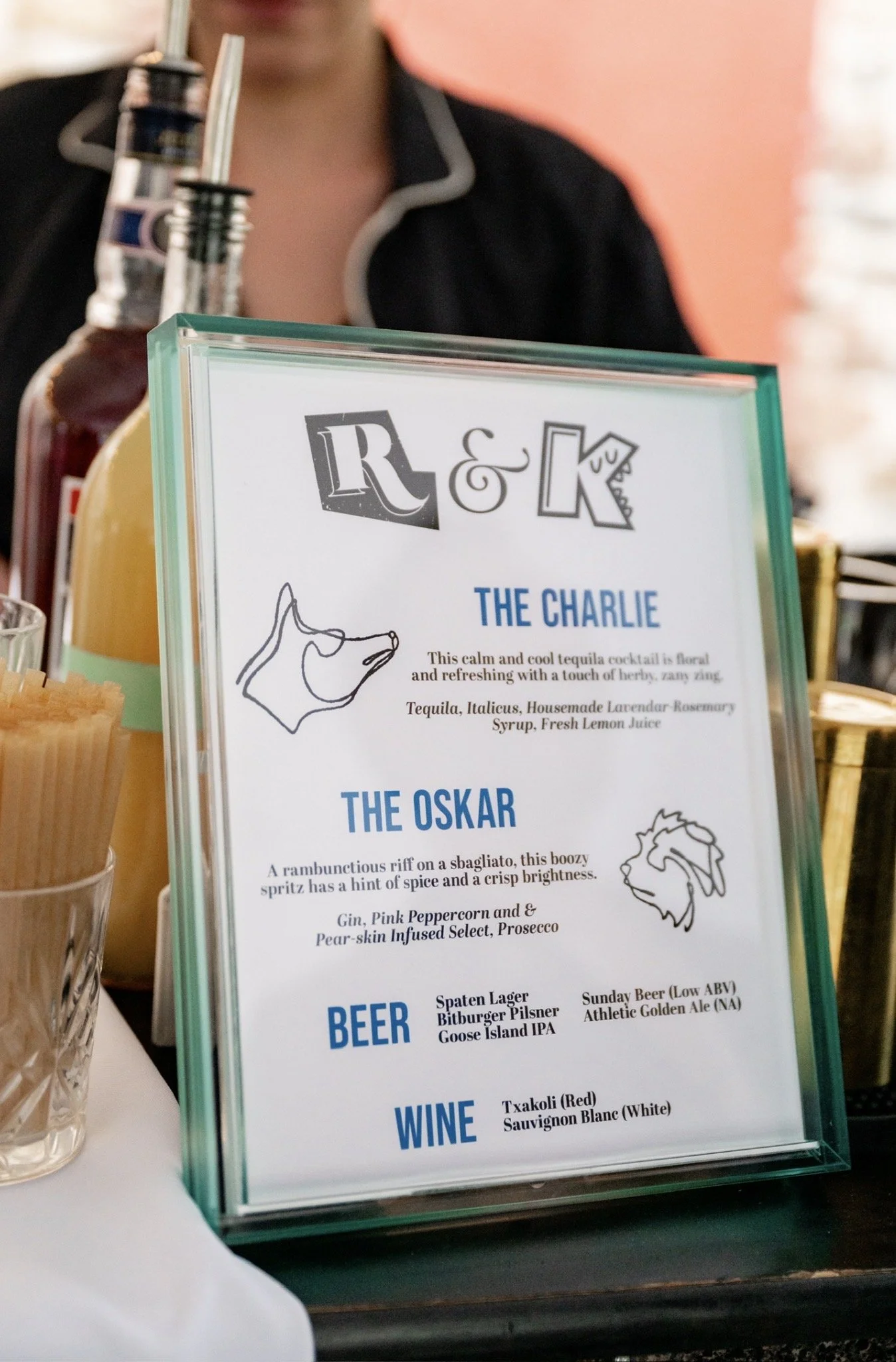 Our signature cocktails were thoughtfully crafted in honor of the grooms’ dogs. Each one representing their personality while still highlighting the grooms’ flavor preferences. How cute is this menu??