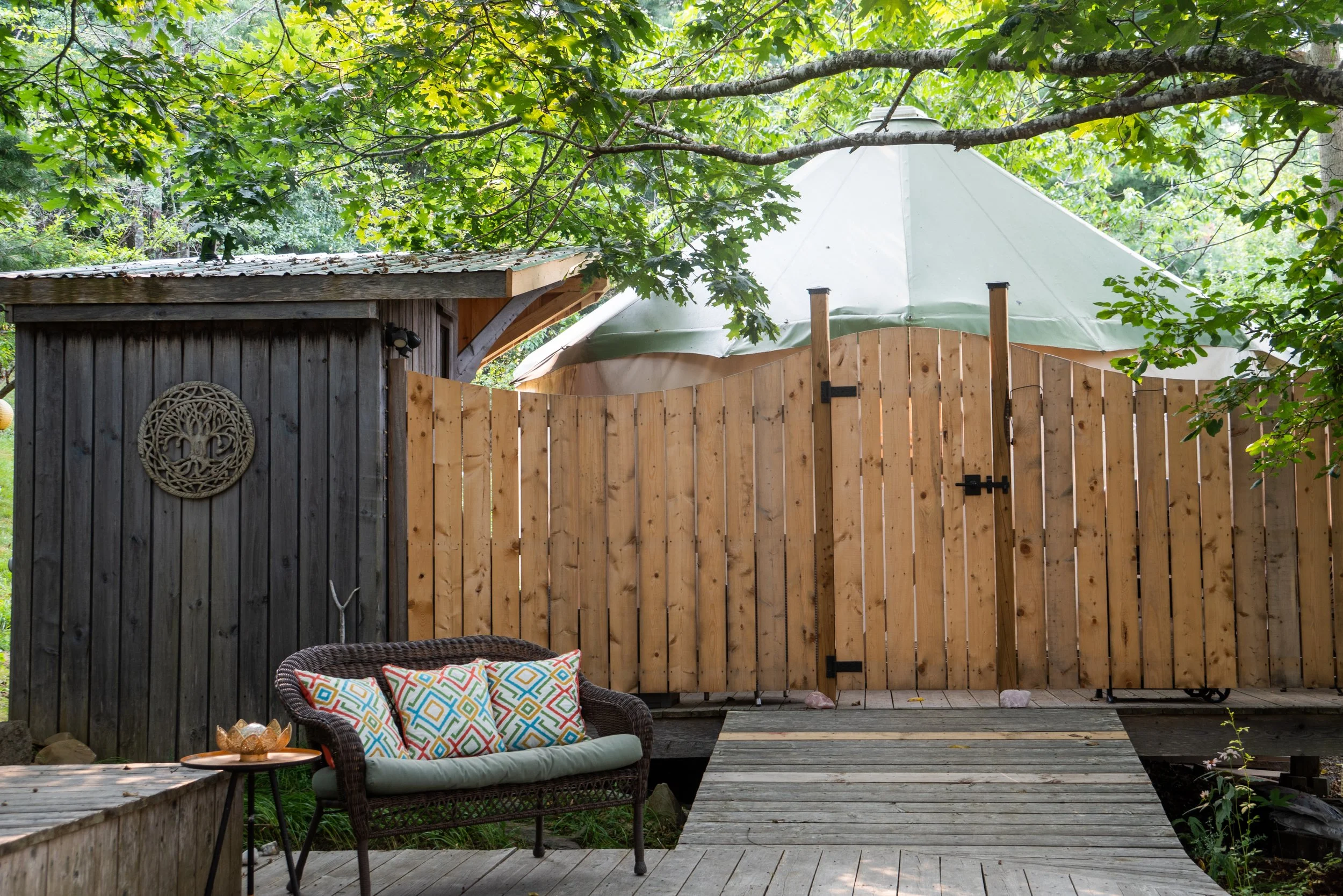 Private outdoor deck and BBQ area at glamping retreat