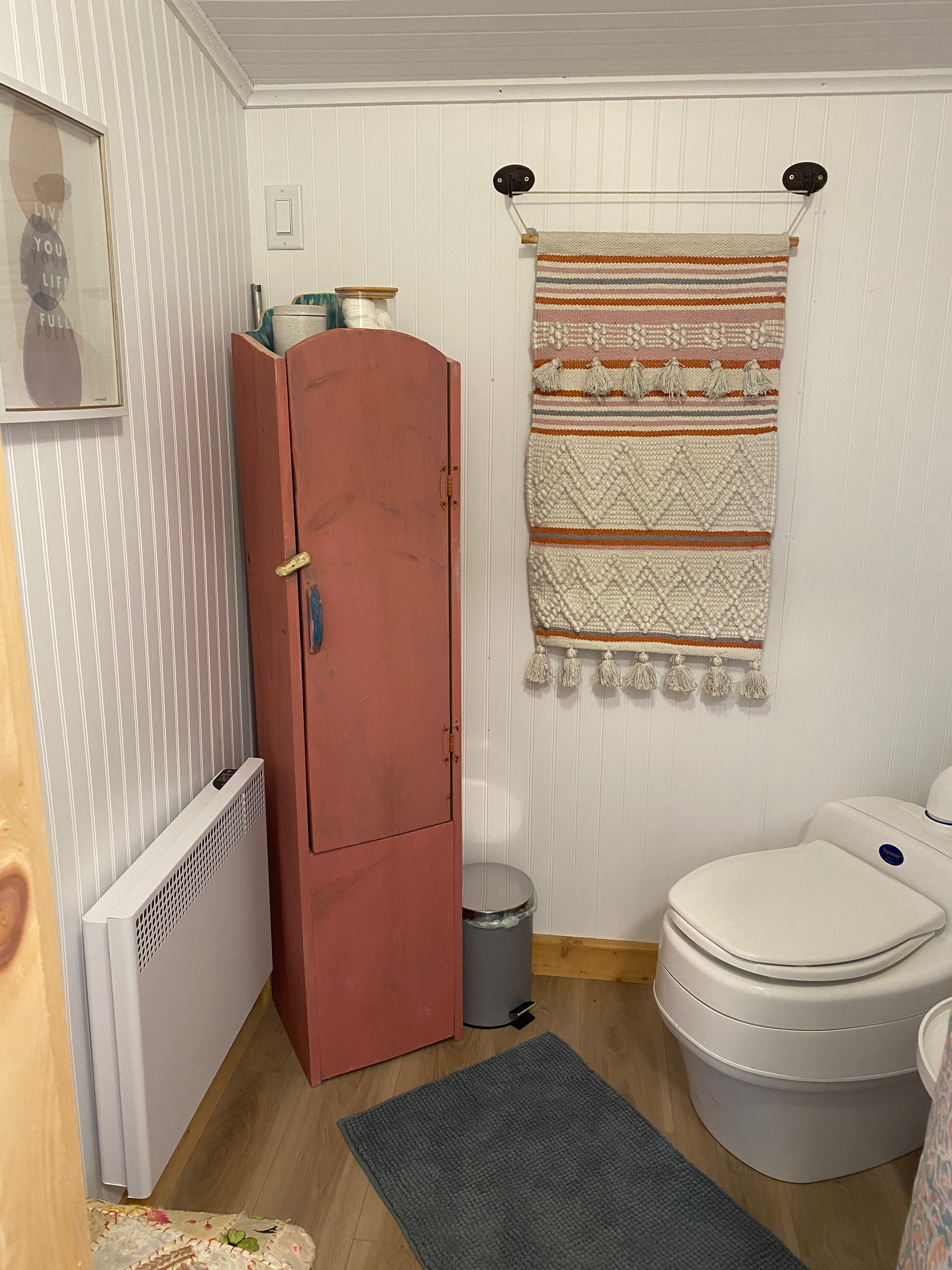 Cozy luxury glamping washroom interior with queen bed
