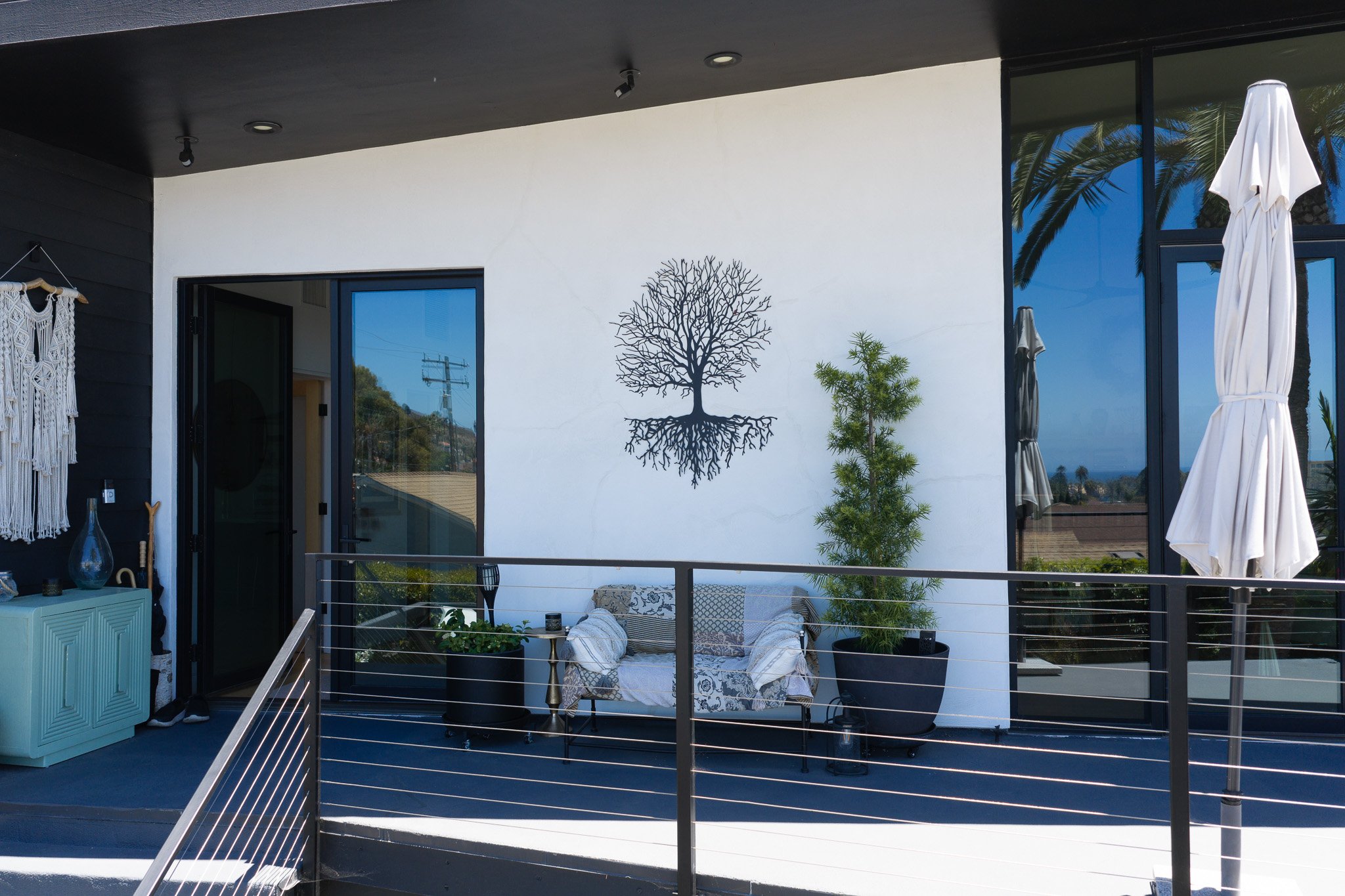 Modern Porch with Tree Art.jpg
