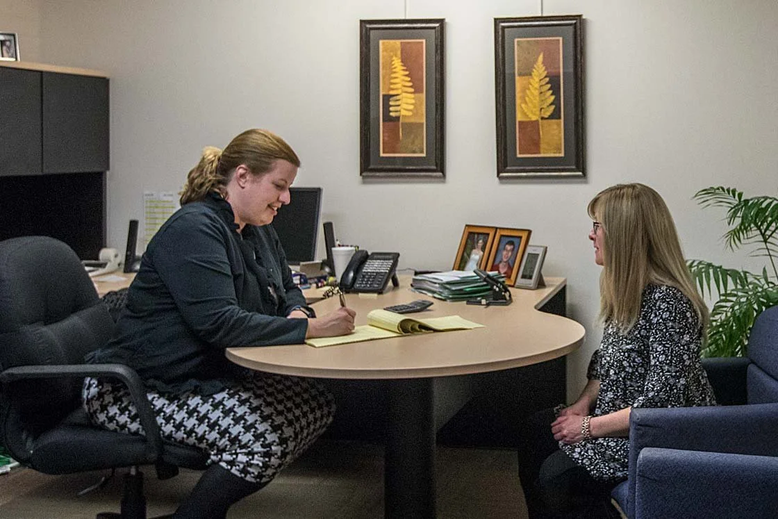 Attorney meeting with a client at PDKST Law Firm in Midland, Michigan, providing trusted legal guidance and estate planning services.