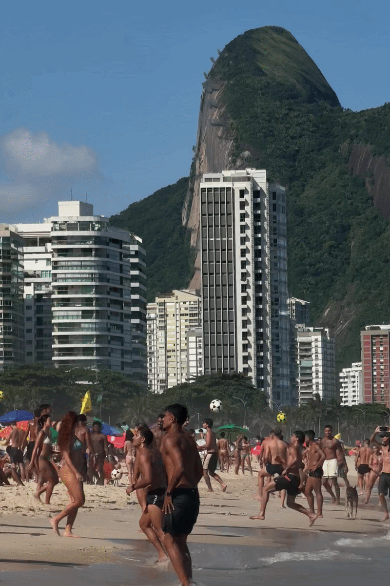 Wellness retreat in Rio de Janeiro, Brazil — Ipanema beach with palm trees and mountain views