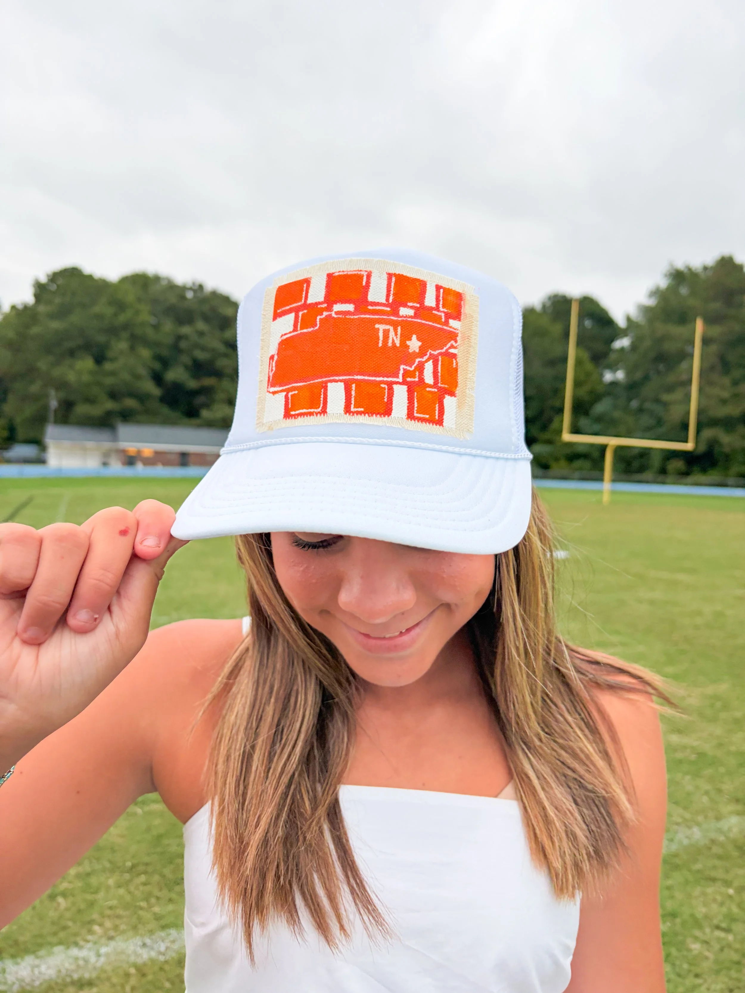 Orange & White TN State on a White Hat