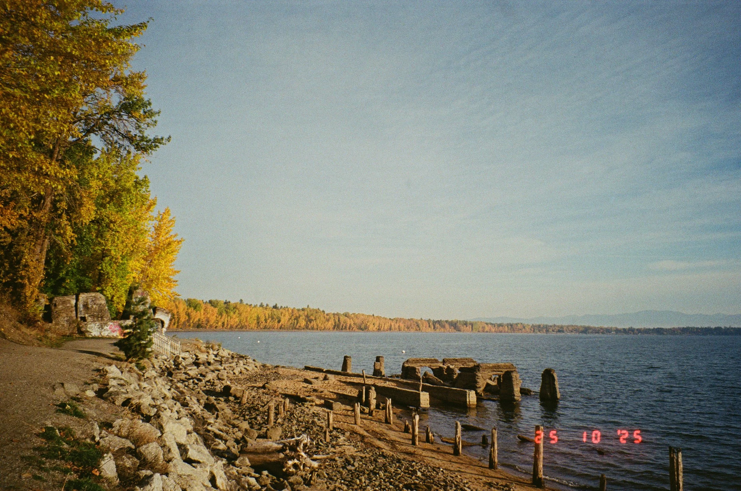 Autumn view of the Pend d'Oreille Bay Trail, featuring the iconic "Ruins" near the trailhead—a well-known landmark and popular stopping point along the trail.