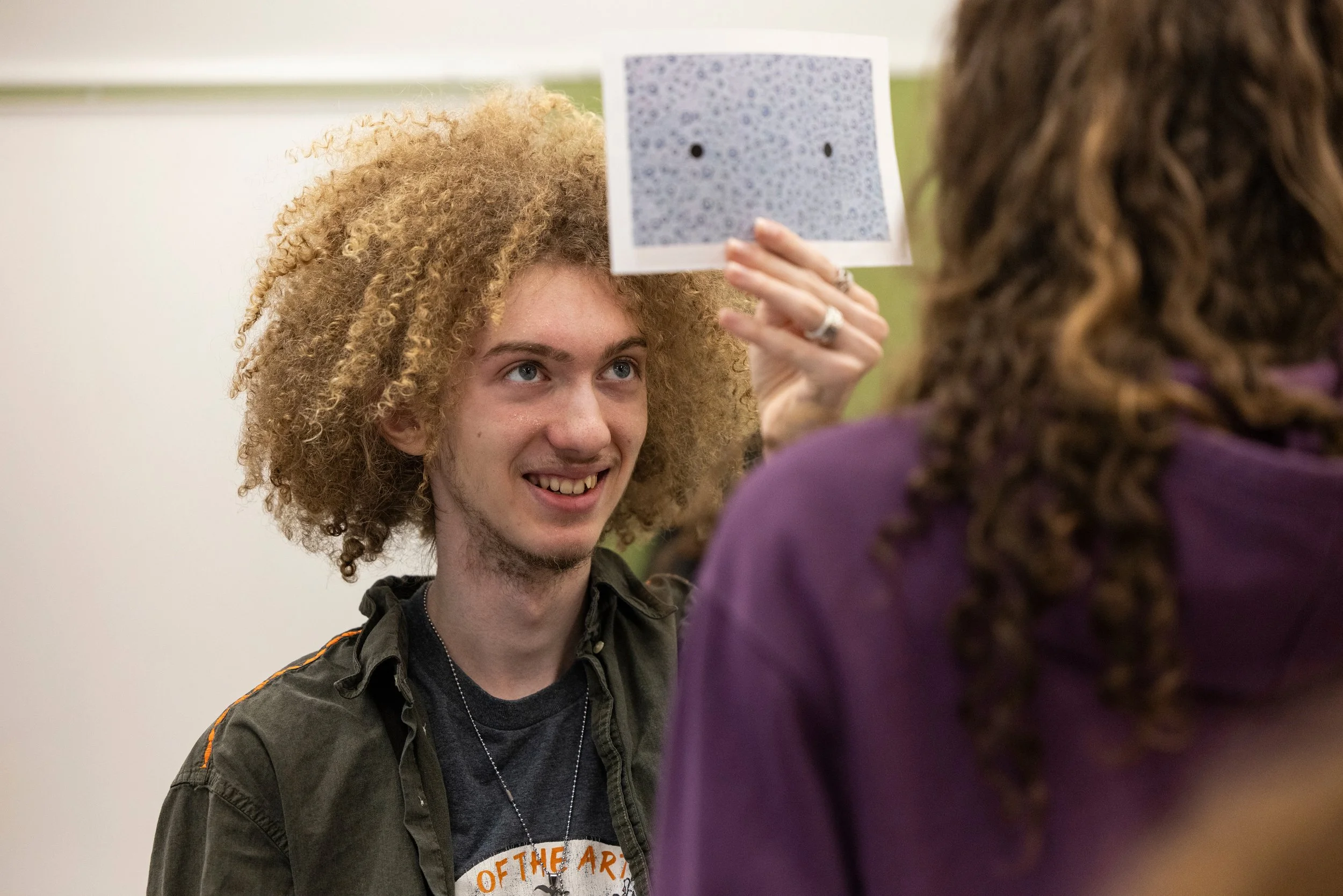 Students exploring a visual perception activity during a Wonder Session