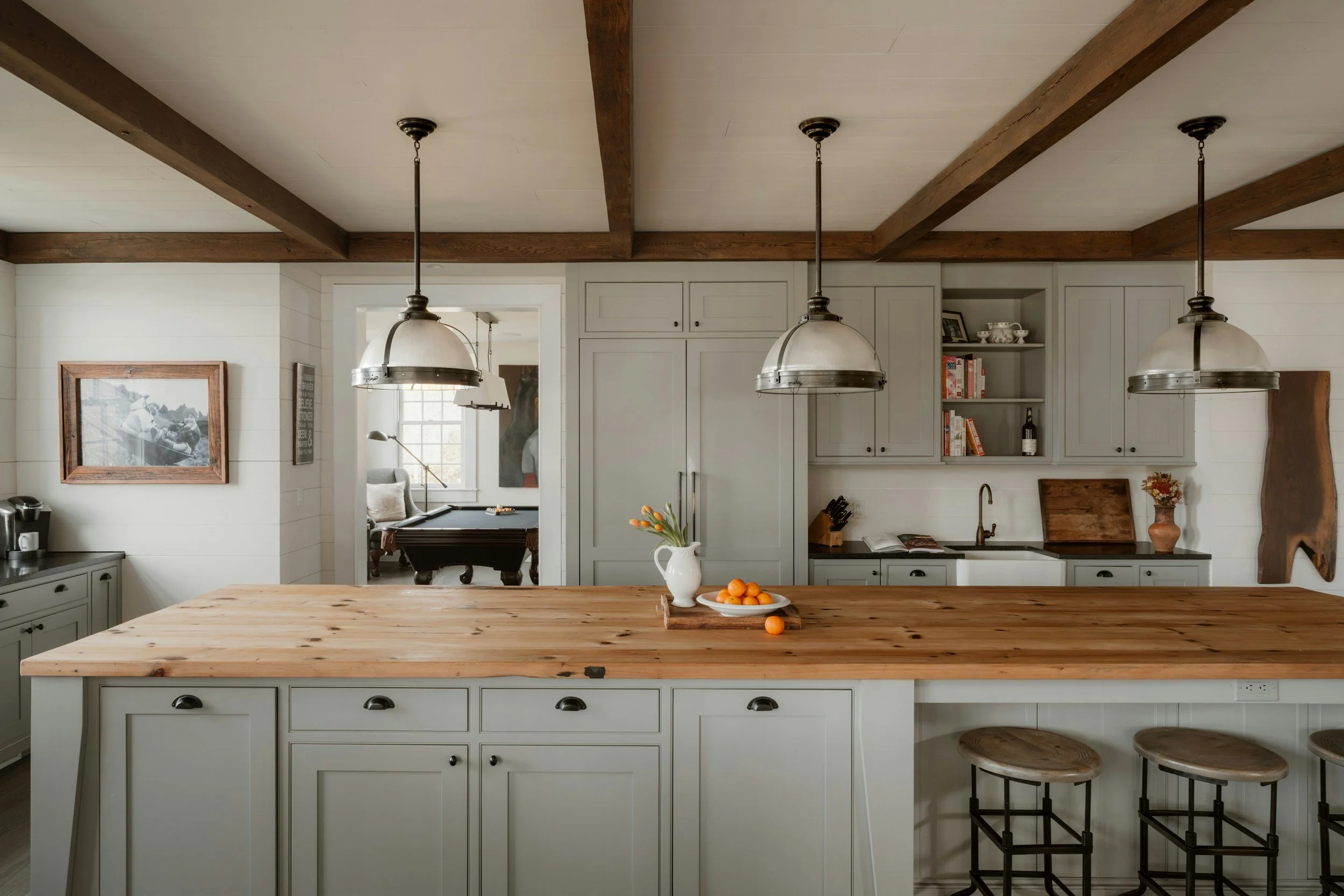 intimate kitchen design, perfect for easy flow, natural lighting, functionality, and entertainment with wood island countertop