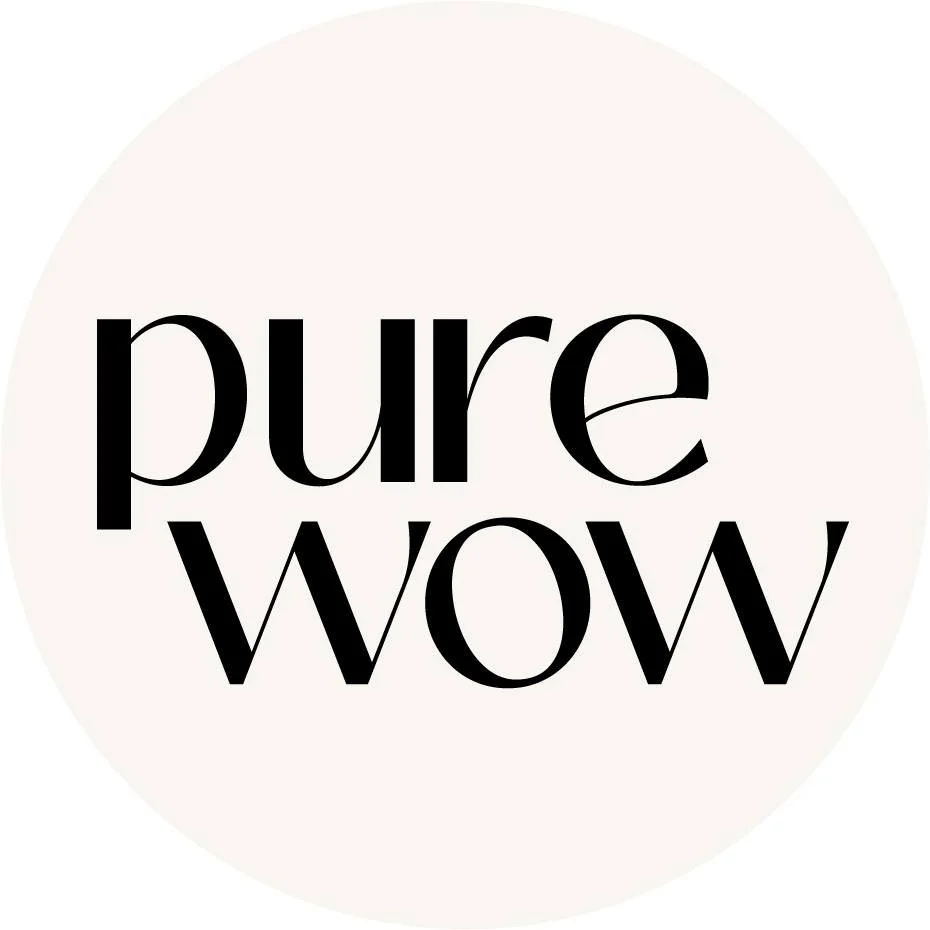 The words 'pure wow' written in black, stylized text on a white circular background.