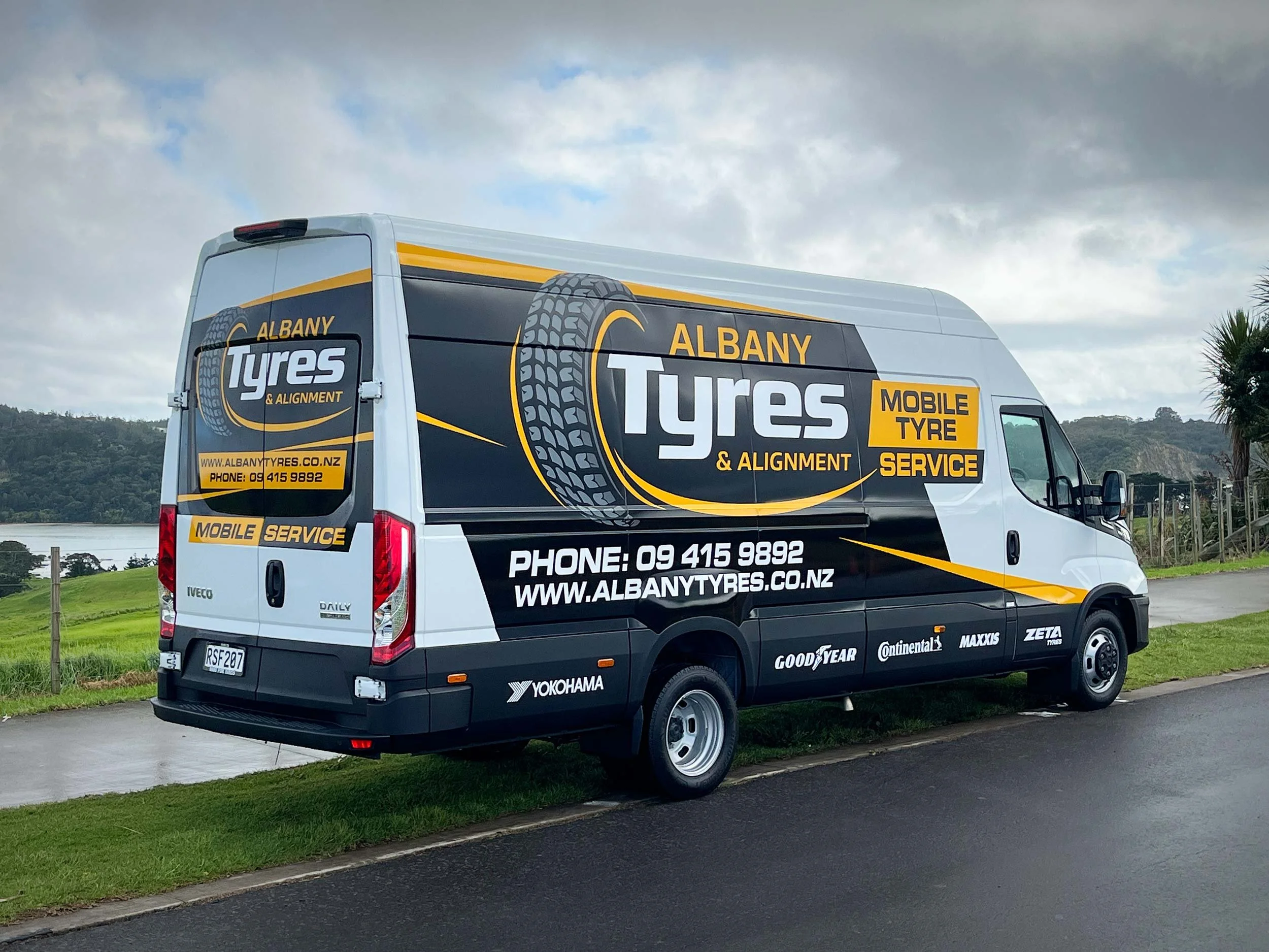 Computer cut vinyl partial wrap van signs