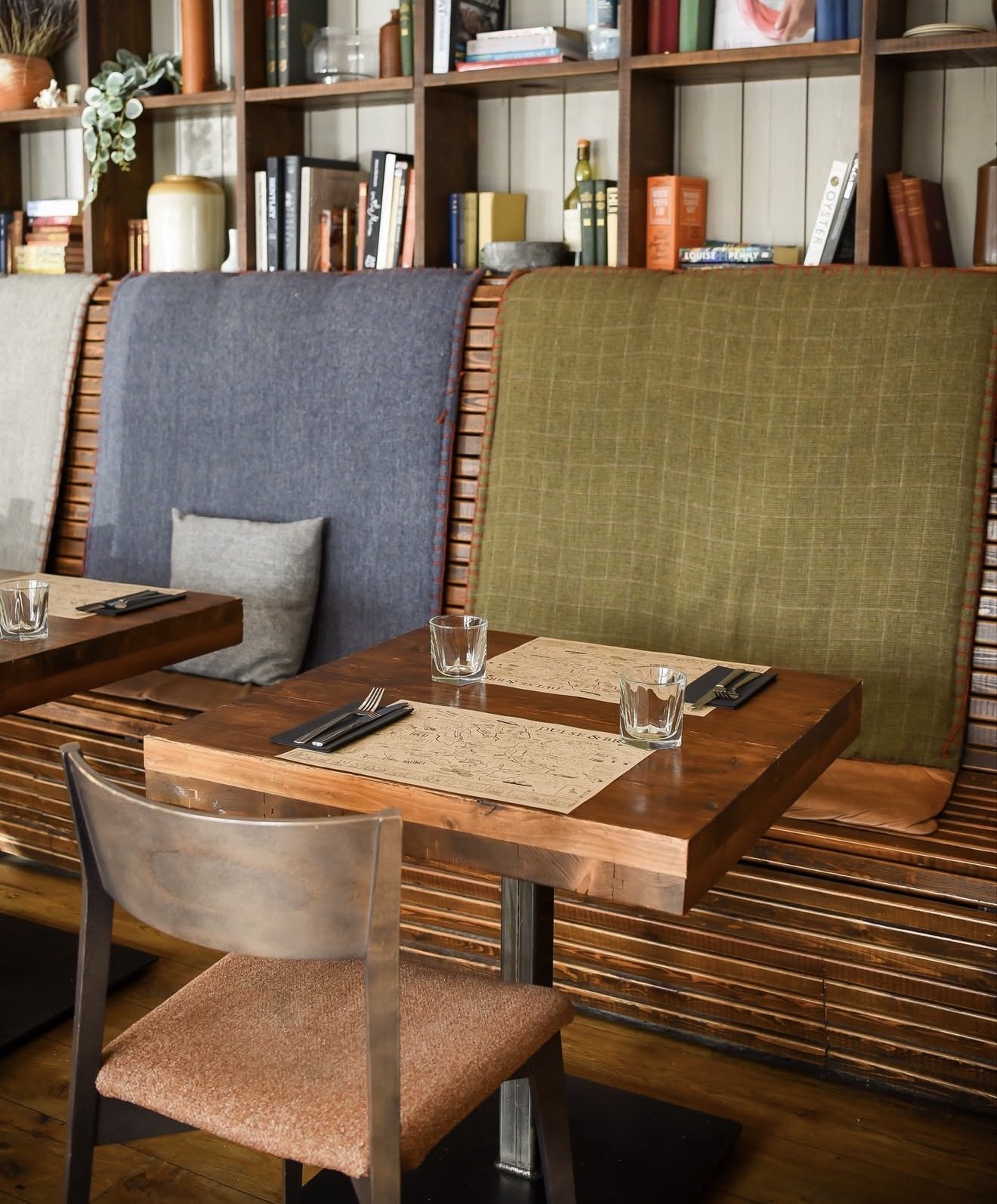 Boutique restaurant interior with colourful seating and relaxed dining atmosphere.