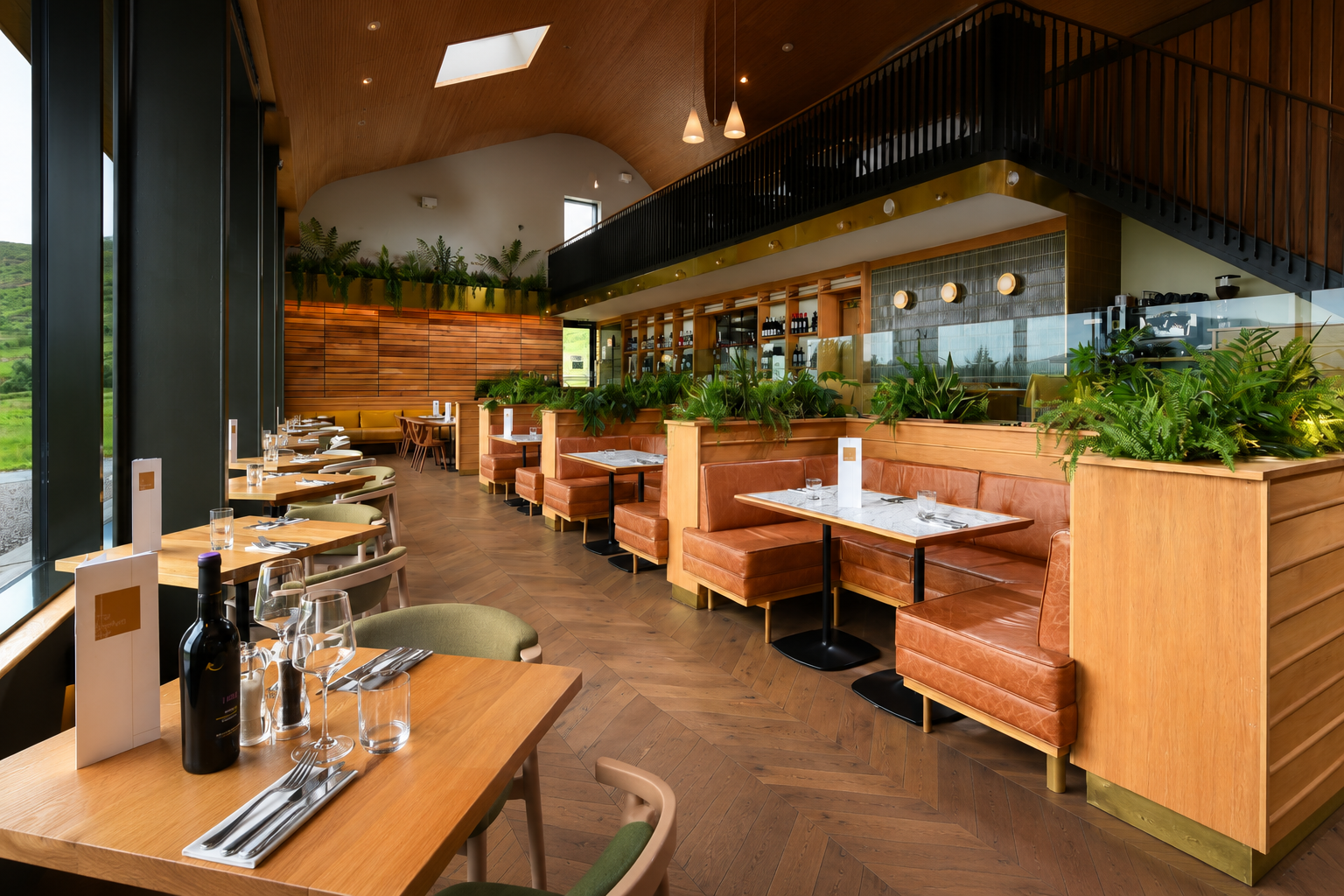 Contemporary Scottish restaurant interior with warm wood finishes and a relaxed hospitality atmosphere.