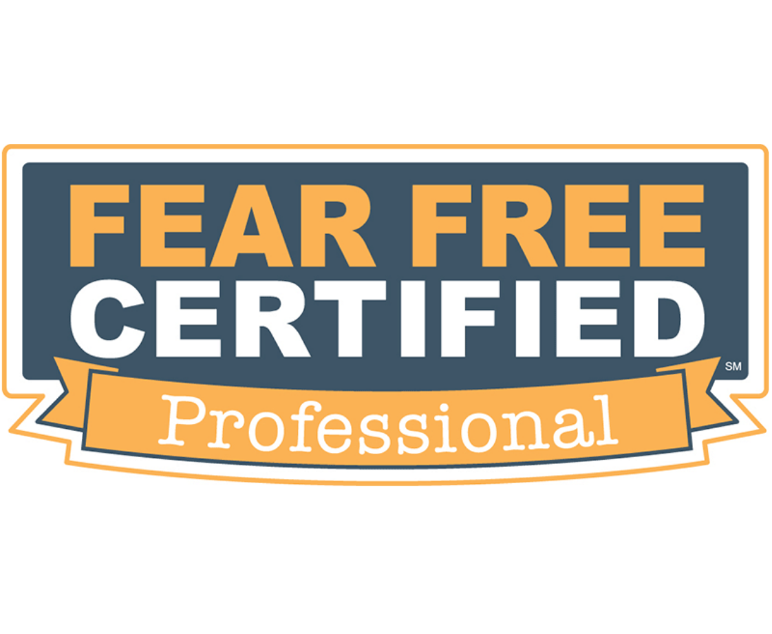Badge that reads 'Fear Free Certified Professional' with orange, white, and dark blue design elements.