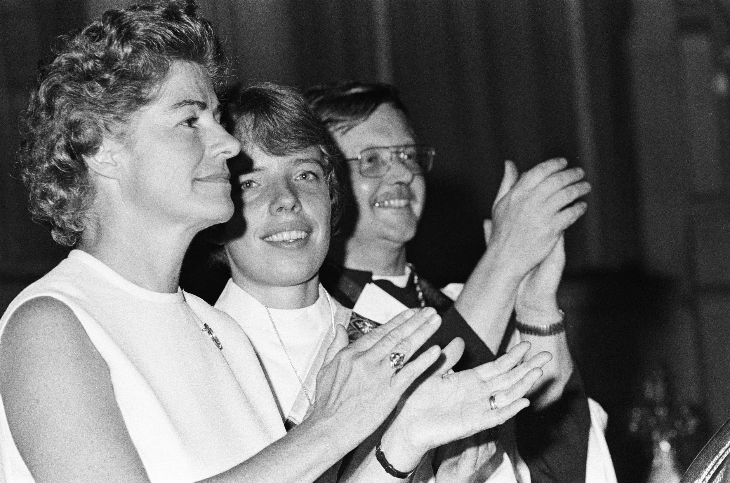 Brad Hess black and white photograph, copyright Darlene O'Dell, Church of the Advocate, Philadelphia Eleven ordinations, July 1974, women priests, Episcopal, large crowd, press, Carter Heyward (center)