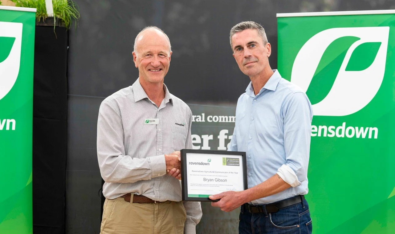 2022 Communicator of the Year Bryan Gibson (right)