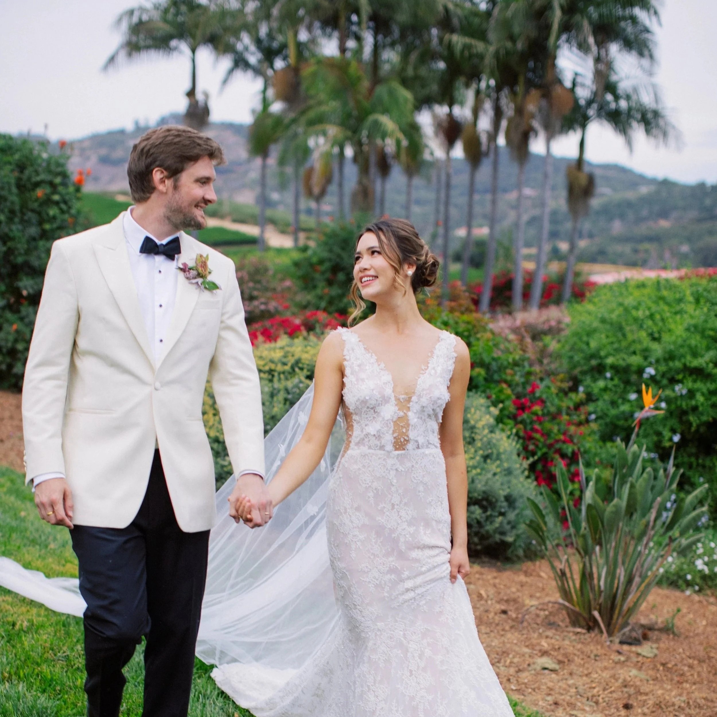 Newly married couple taking portraits at Rancho Vera Cruz wedding venue
