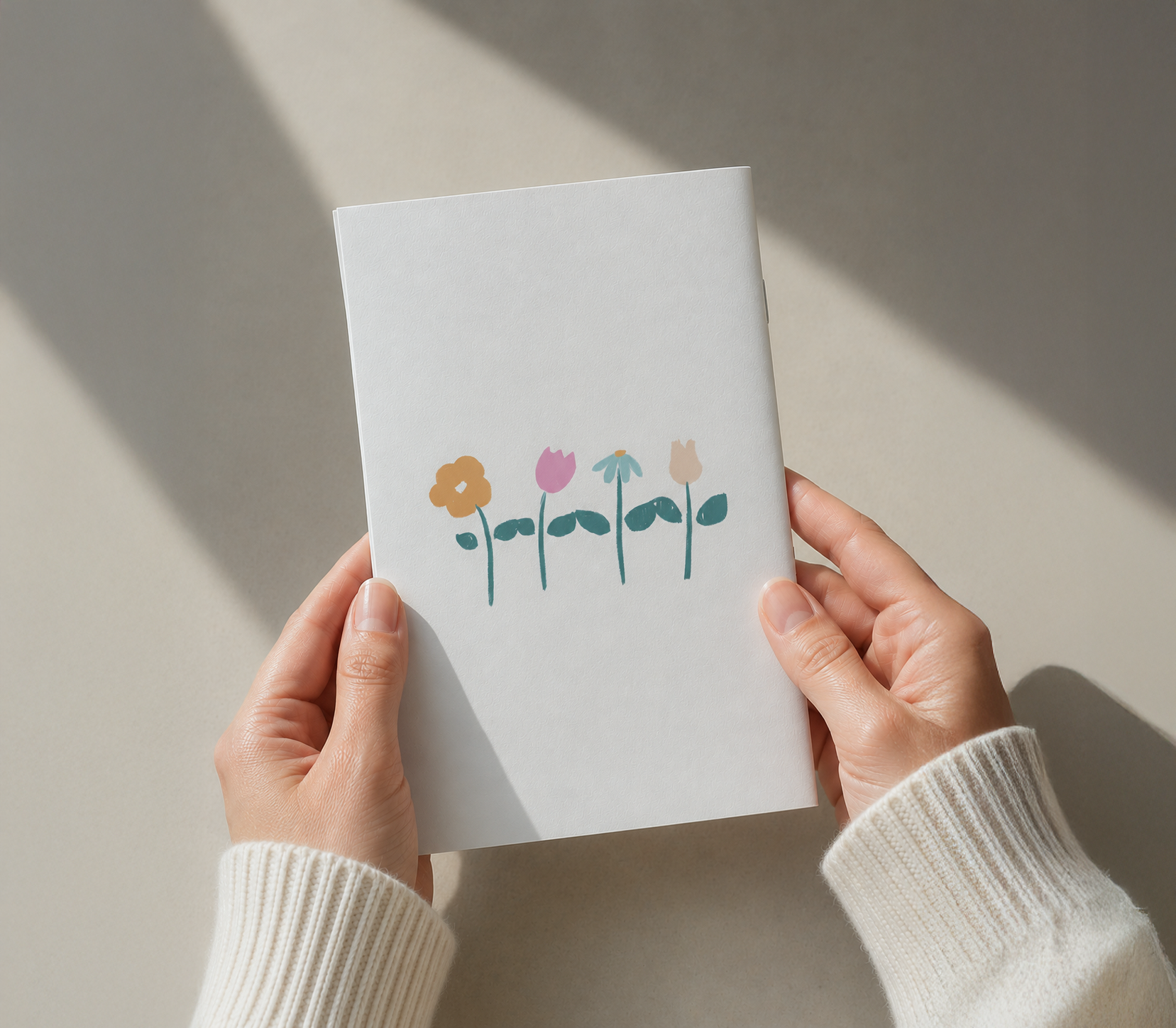 Person Holding Zine_Back.png