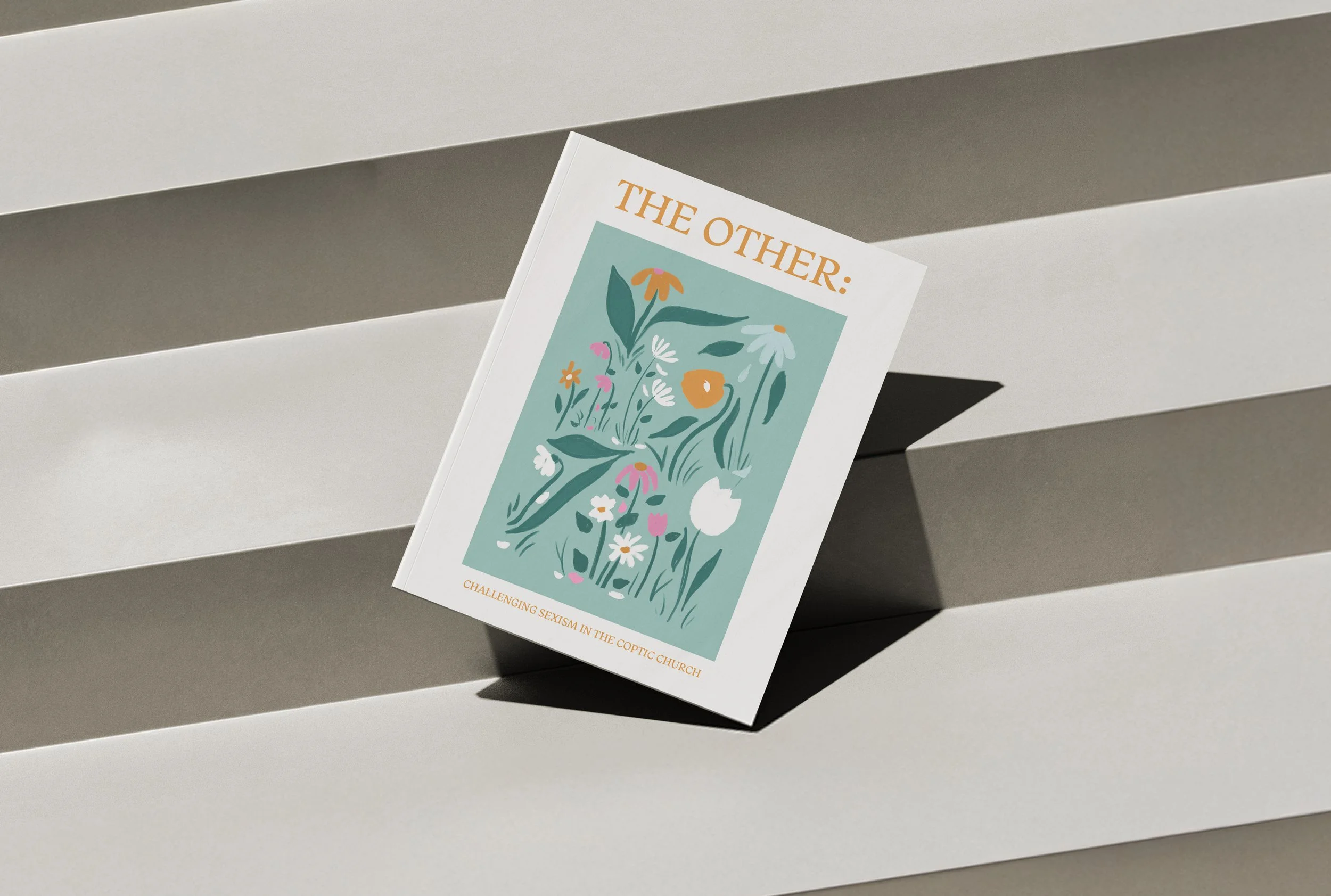 cover-magazine-mockup-on-the-steps-front-view.jpg