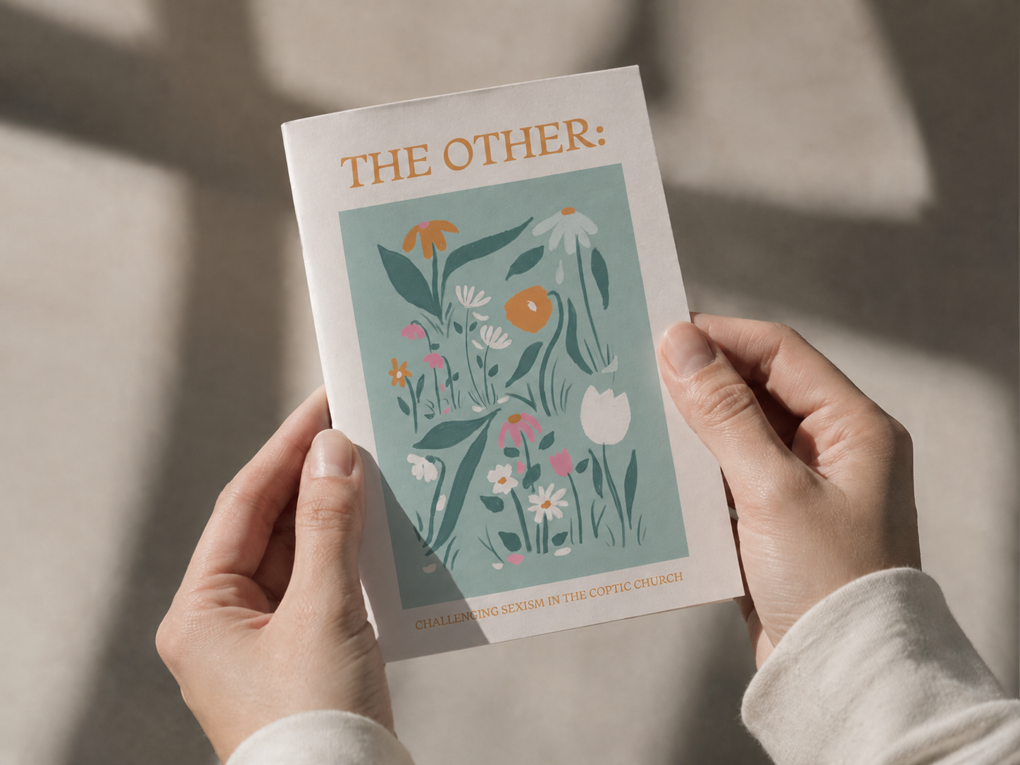 Person Holding Zine.png