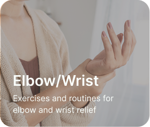 woman holding her wrist indicating wrist pain