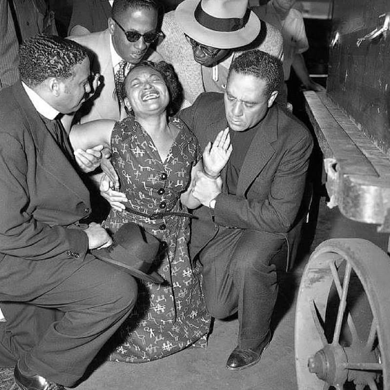 In 1955 at Roberts Temple #COGIC, Bishop Louis Henry Ford eulogized Emmett Till, the slain teen whose death was the catalyst for the Civil Rights Movement. Pictured here, Bishop Ford (right) and Bishop Isaiah L. Roberts (left) at the side of Till's m