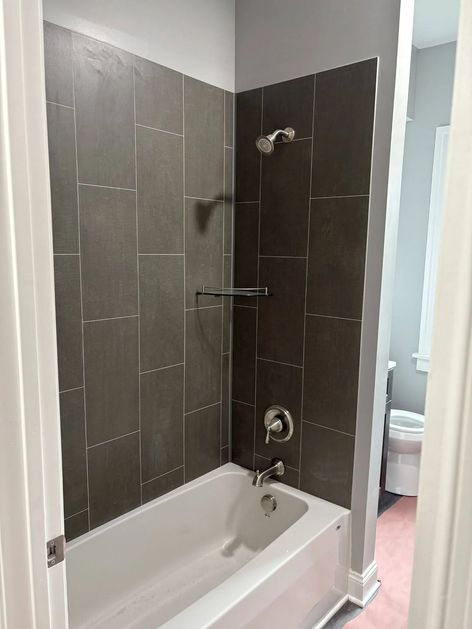 Shower updated with new large tile pattern