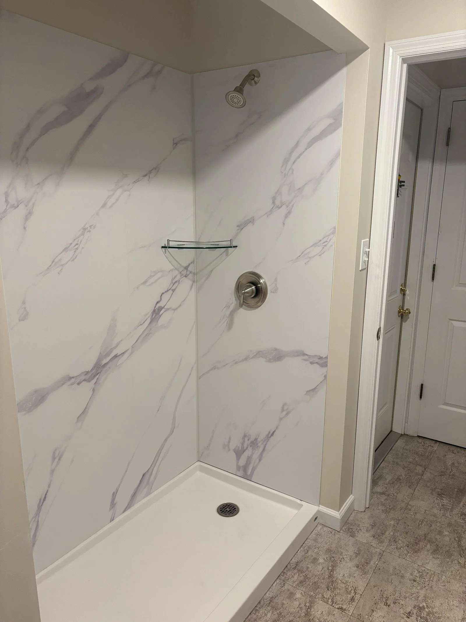 Updated bathroom fixtures and hardware for shower