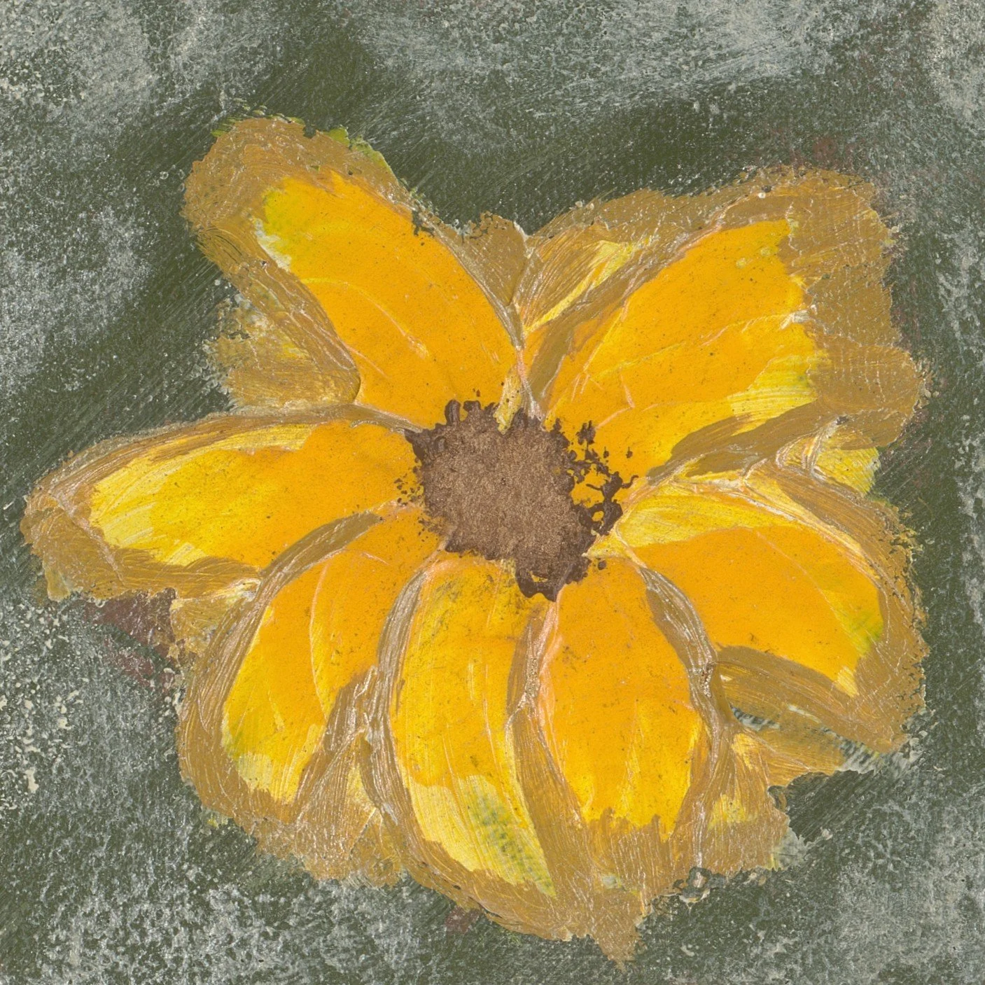 Close-up of a flower-shaped artistic design made with yellow and brown pressed leaves on a rough gray surface.