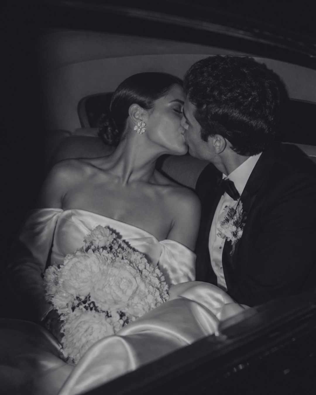 Guests filming candid wedding moments with a Sony 4K camcorder