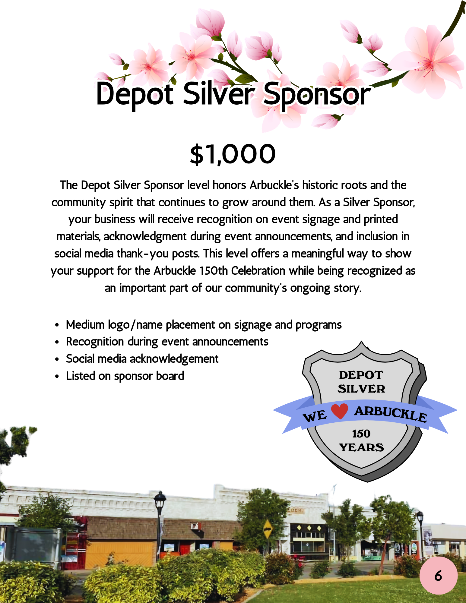 A colorful flyer or poster celebrating the 150th anniversary of Arbuckles with pink cherry blossom flowers at the top and a shield-shaped emblem with a blue ribbon reading "WE ❤️ ARBUCKLE" and a red heart in the center. The background shows a town square with storefronts, trees, and a lamp post.