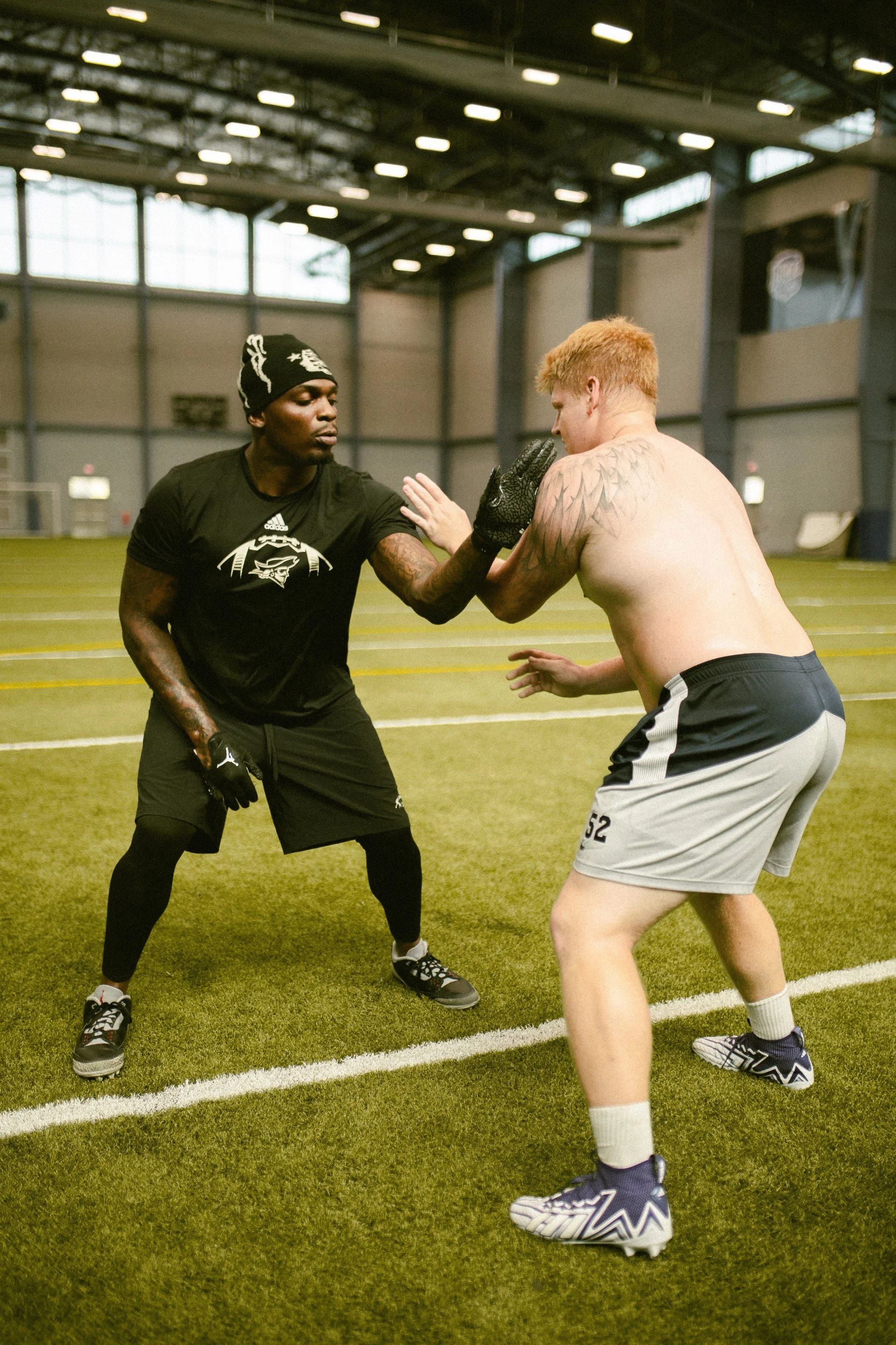 #dlineu Pass Rush Summit Iowa Western Football Perrion Winfrey and Jordan Van Den Berg working out