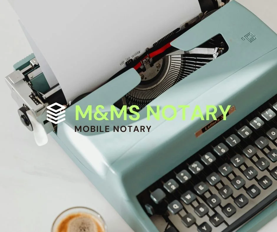 A vintage teal typewriter with a sheet of paper inserted, positioned on a white surface. Part of a cup of coffee and a black object are visible in the foreground. Overlaid text reads 'M&MS Notary Mobile Notary'.