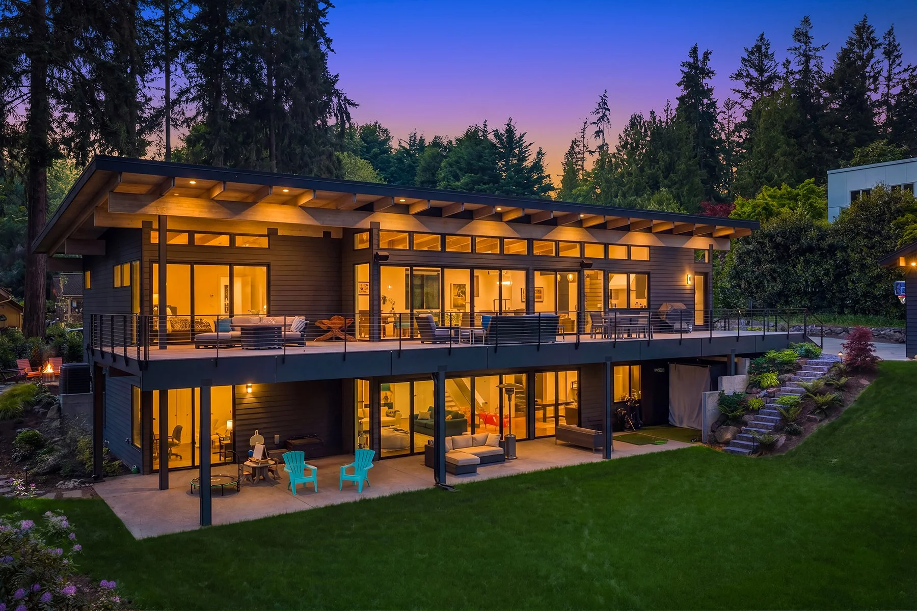 glass & wood make the back of the home really stand out