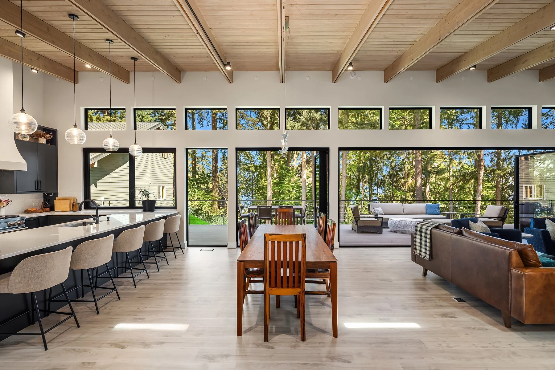 Open floor plan with exposed beams & 48' Cantina accordion wall. 
