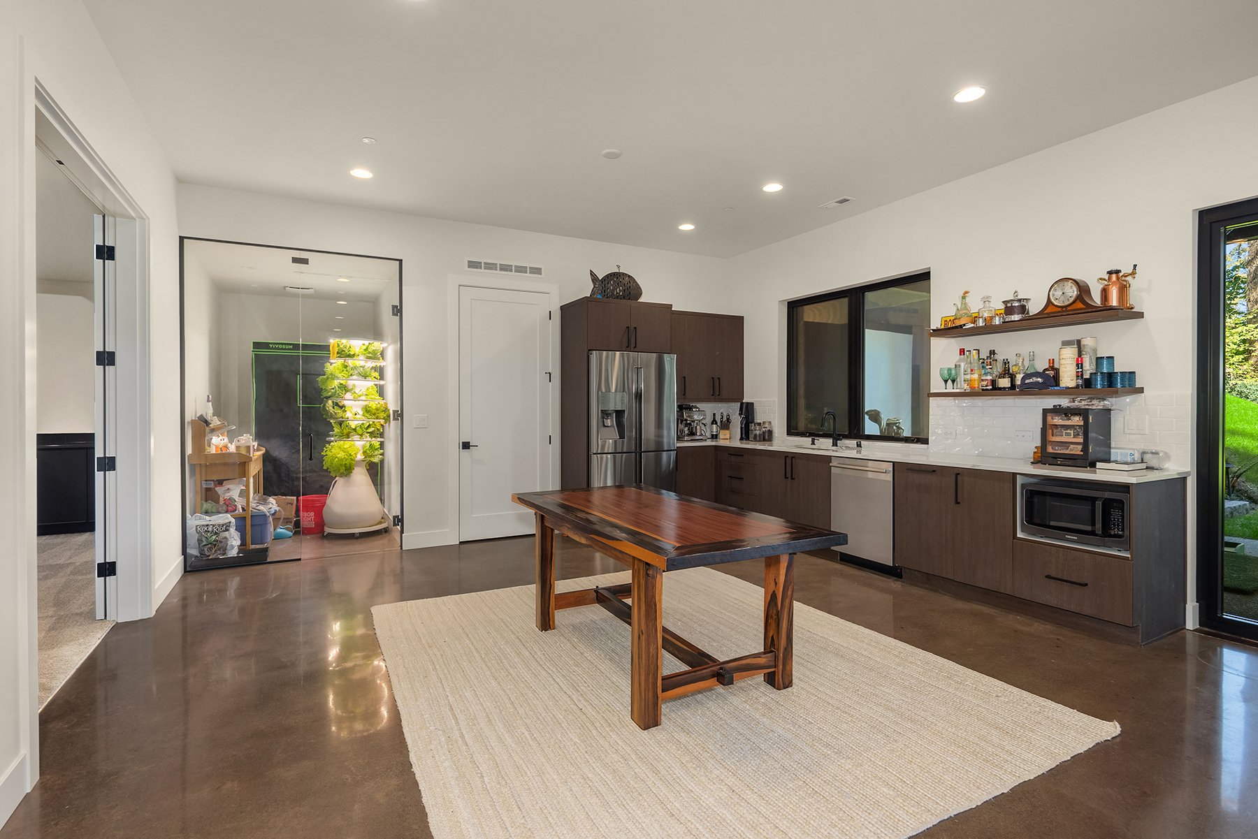 Kitchenette with pass through window - indoor garden designed to be a wine cellar. 