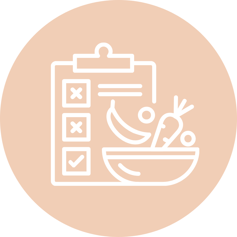 Outline of a food checklist on a clipboard beside a bowl of vegetables and a banana.