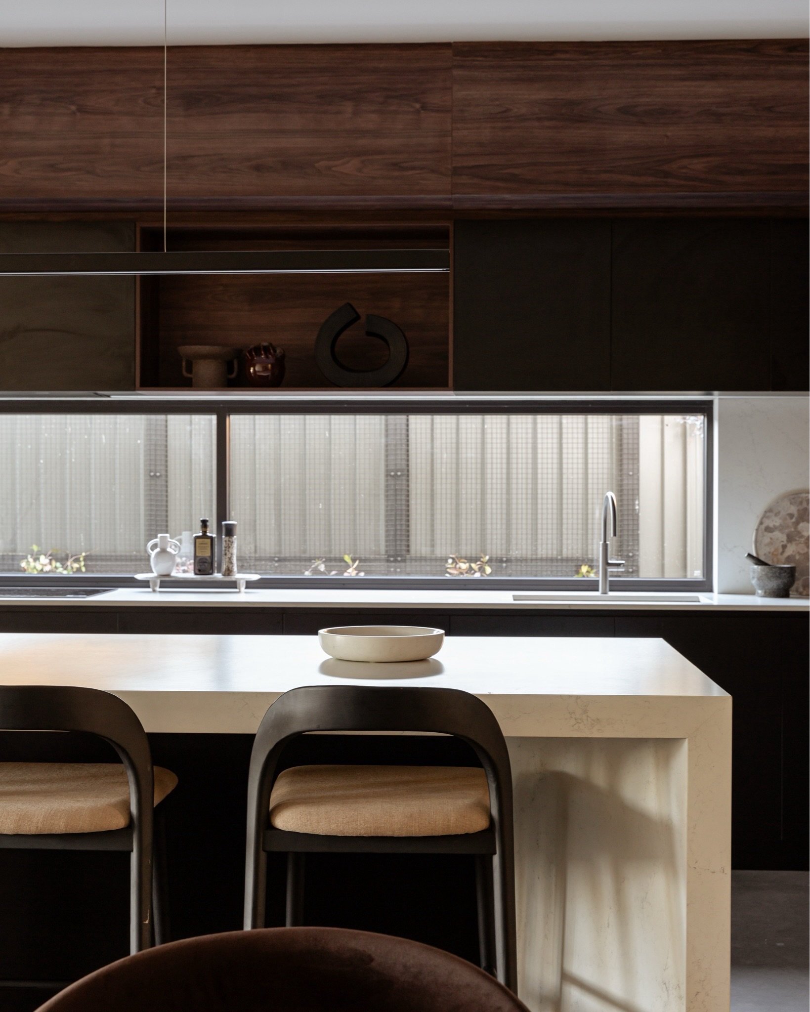 There&rsquo;s something about walnut that just makes a space feel instantly warmer.

In this brand-new build, the rich timber tones bring depth and character, creating a home that feels beautifully warm and inviting 🤎

#elevatewithPSCO #designthatse