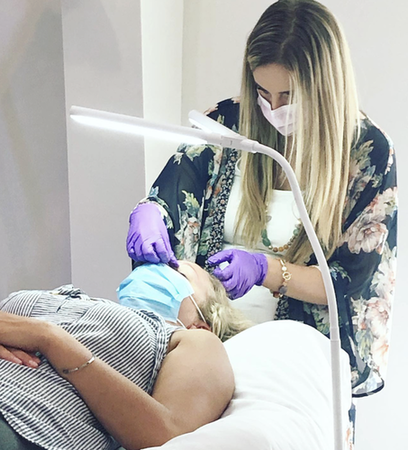 Jessica working with a client