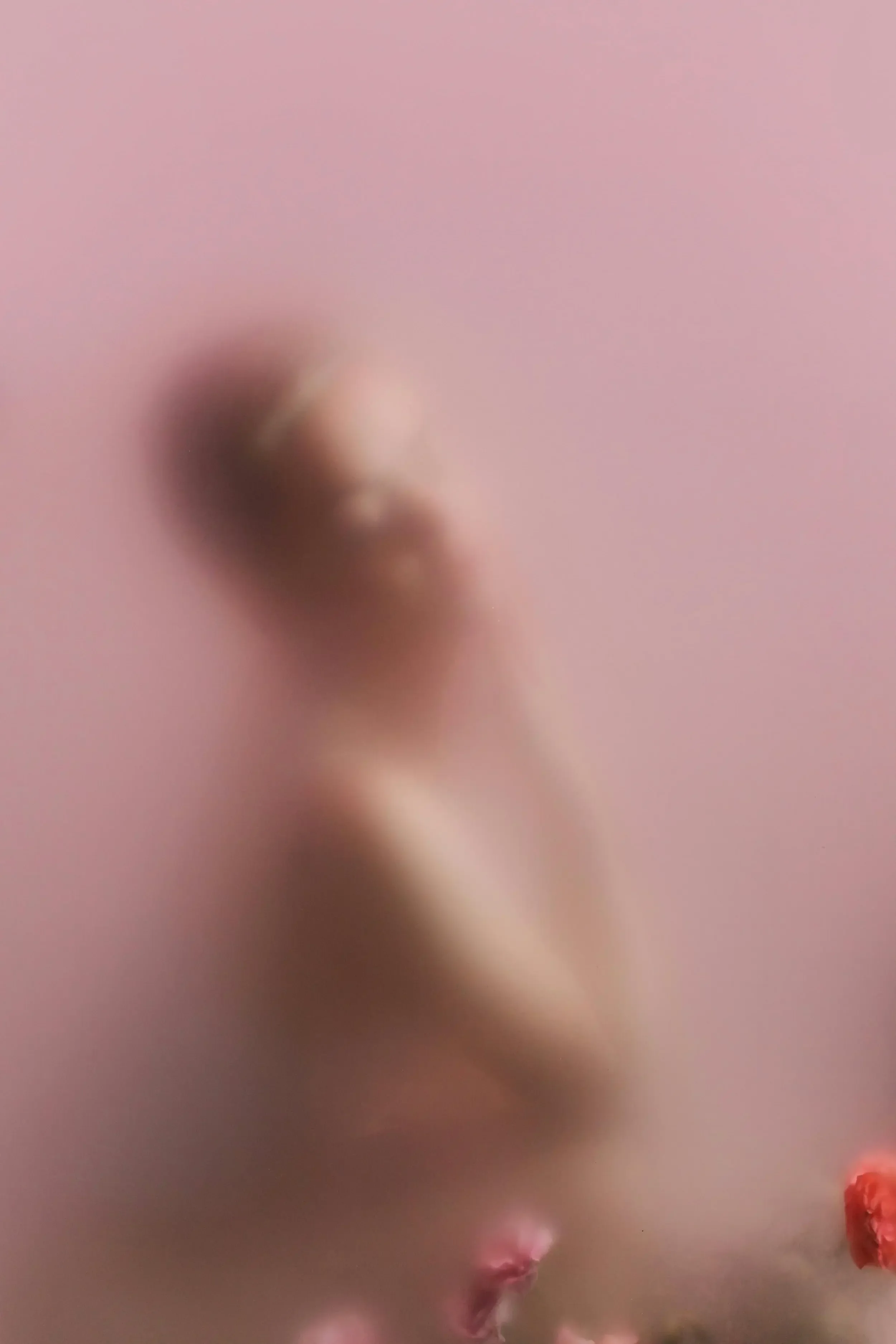 a blurred image of a woman